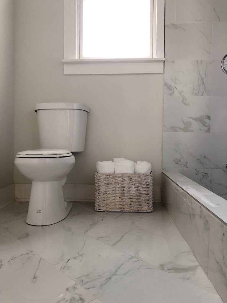https://my100yearoldhome.com/wp-content/uploads/2019/07/Waco-Home-Bath-Remodel-tile-flooring-2.jpg