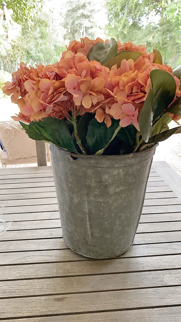 Finished faux floral arrangement