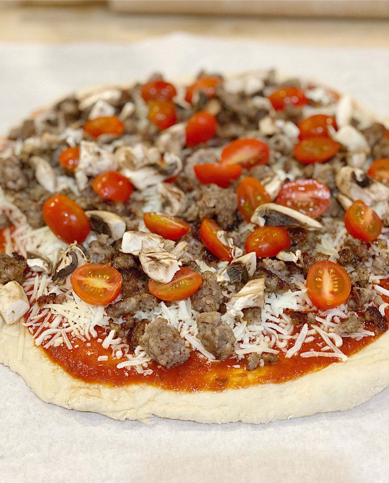 homemade sausage and mushroom pizza