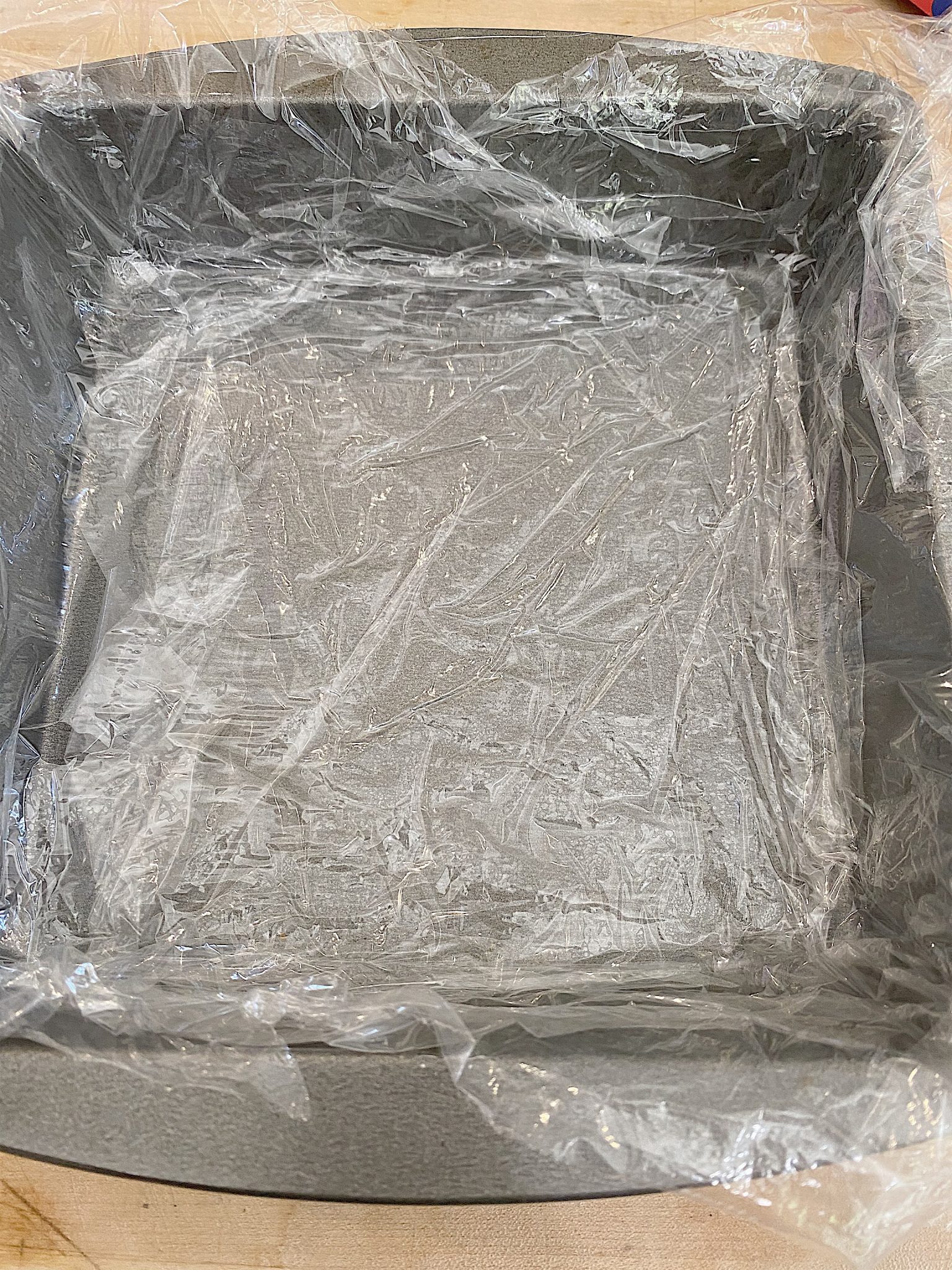 Line the Pan with Saran Wrap