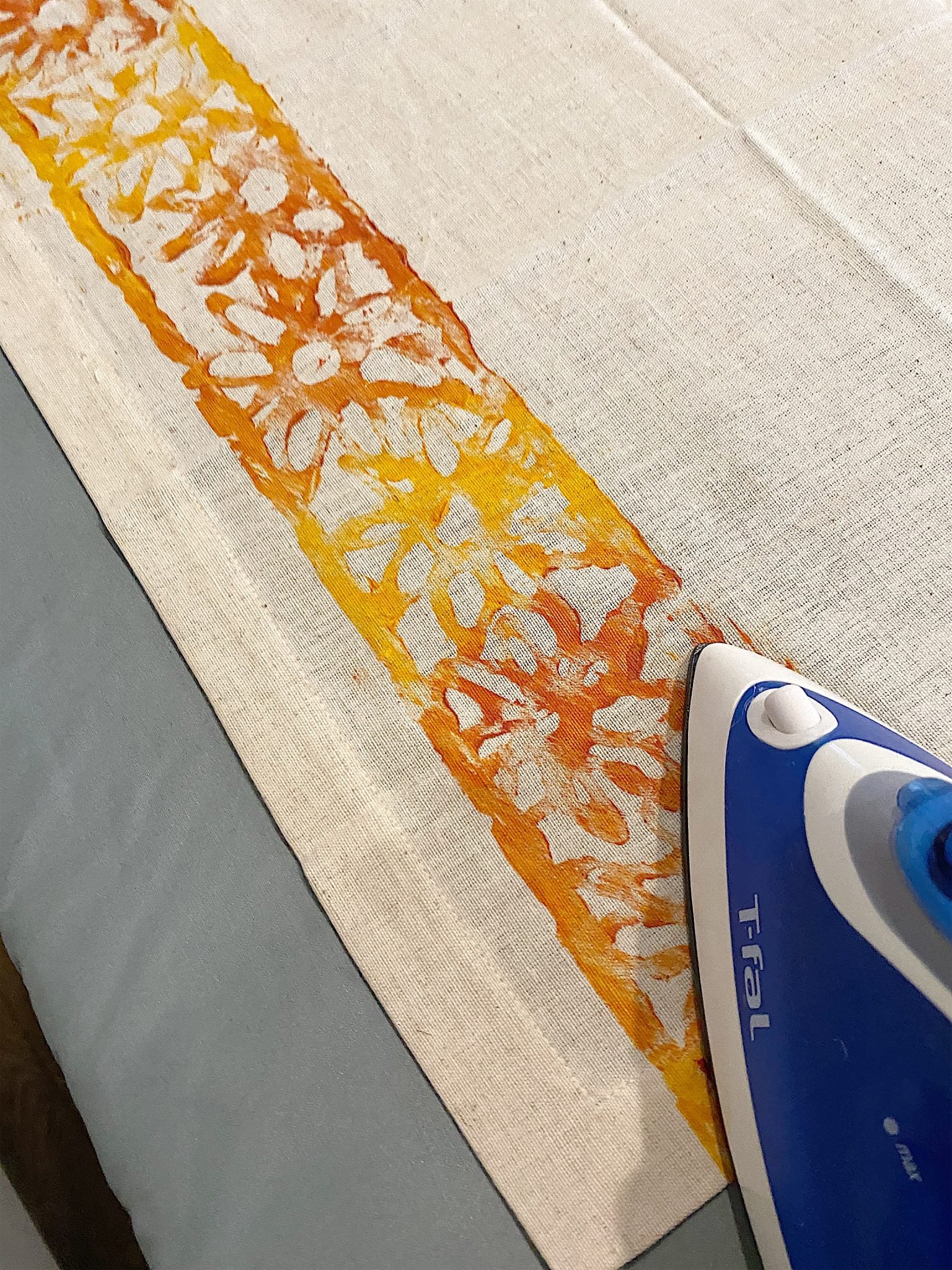 Ironing the Napkin to Set the Acrylic Paint