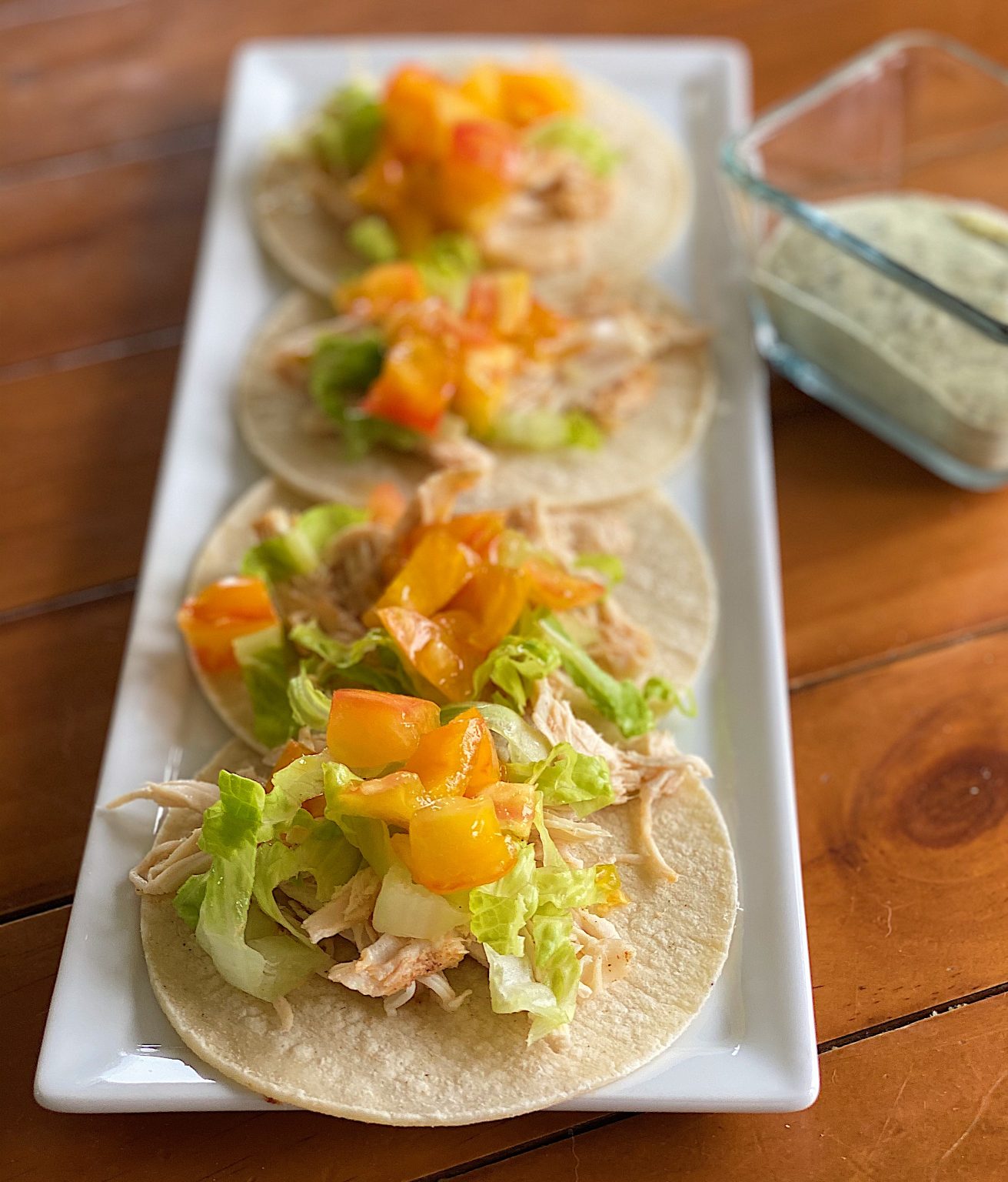 Crock Pot Chicken Tacos with Cilantro Cream Sauce 