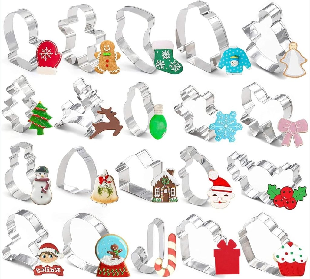 Various Christmas-themed cookie cutters are displayed, perfect for a DIY Christmas gift. Shapes include a snowman, reindeer, Christmas tree, and gingerbread man.