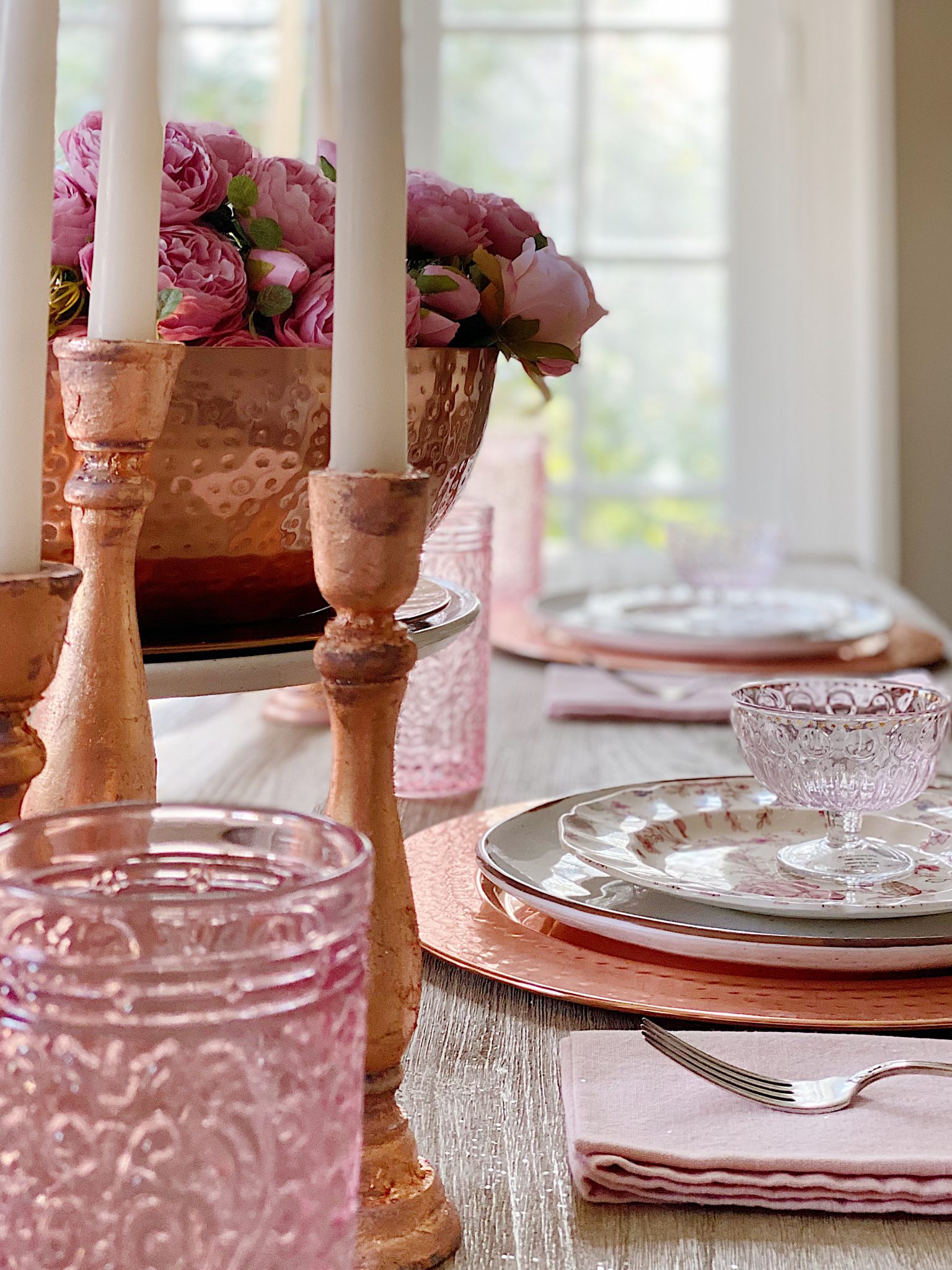 Rose Gold Candlesticks on the Table