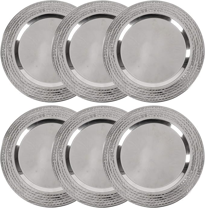 Six round, silver-colored stainless steel plates are arranged in two rows of three. Perfect for serving your favorite dinner party recipes, each plate features a textured, patterned rim and a smooth center surface.