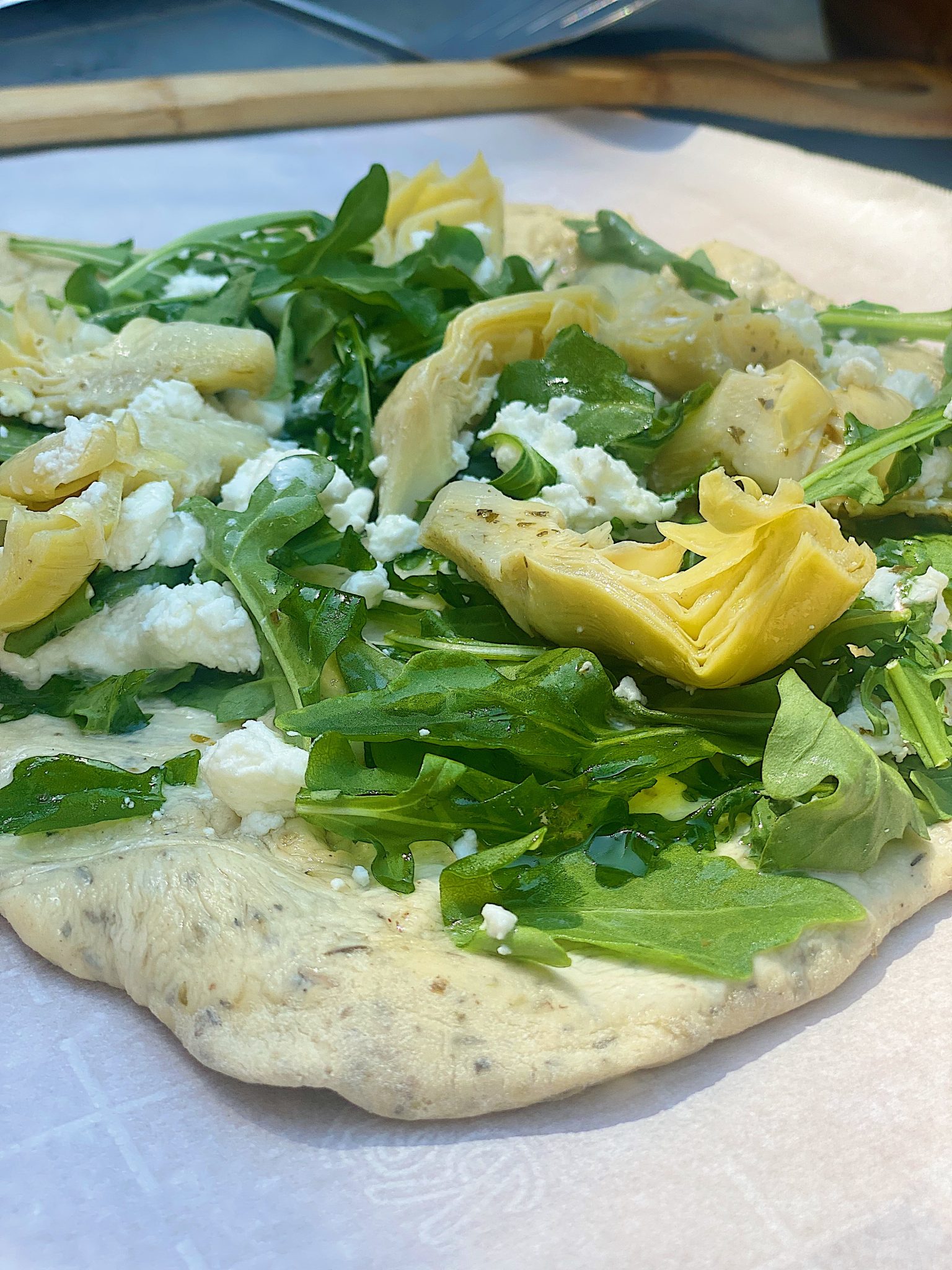 How to Make Arugula, Goat Cheese and Artichoke Pizza