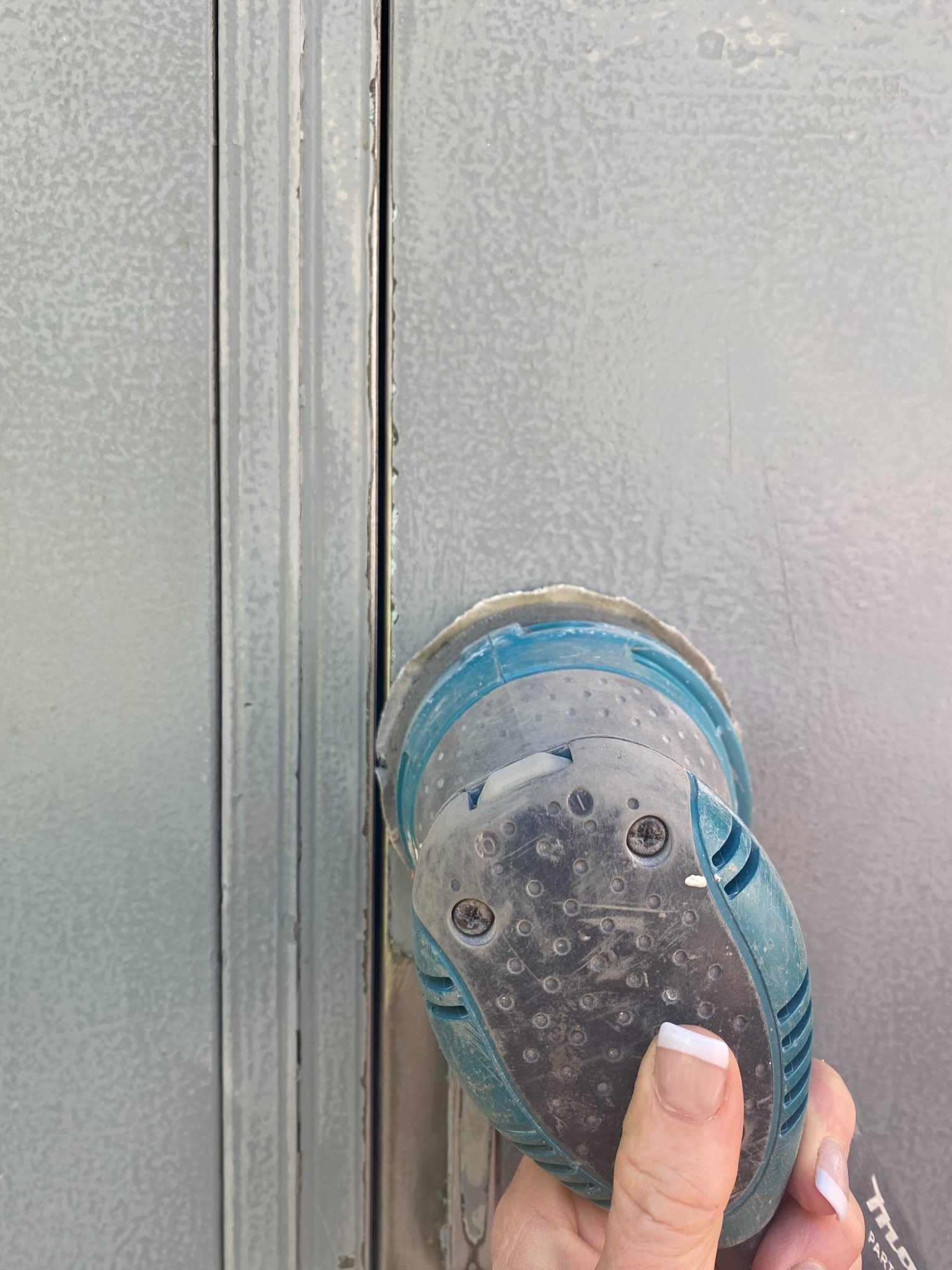 Sanding Metal School Lockers