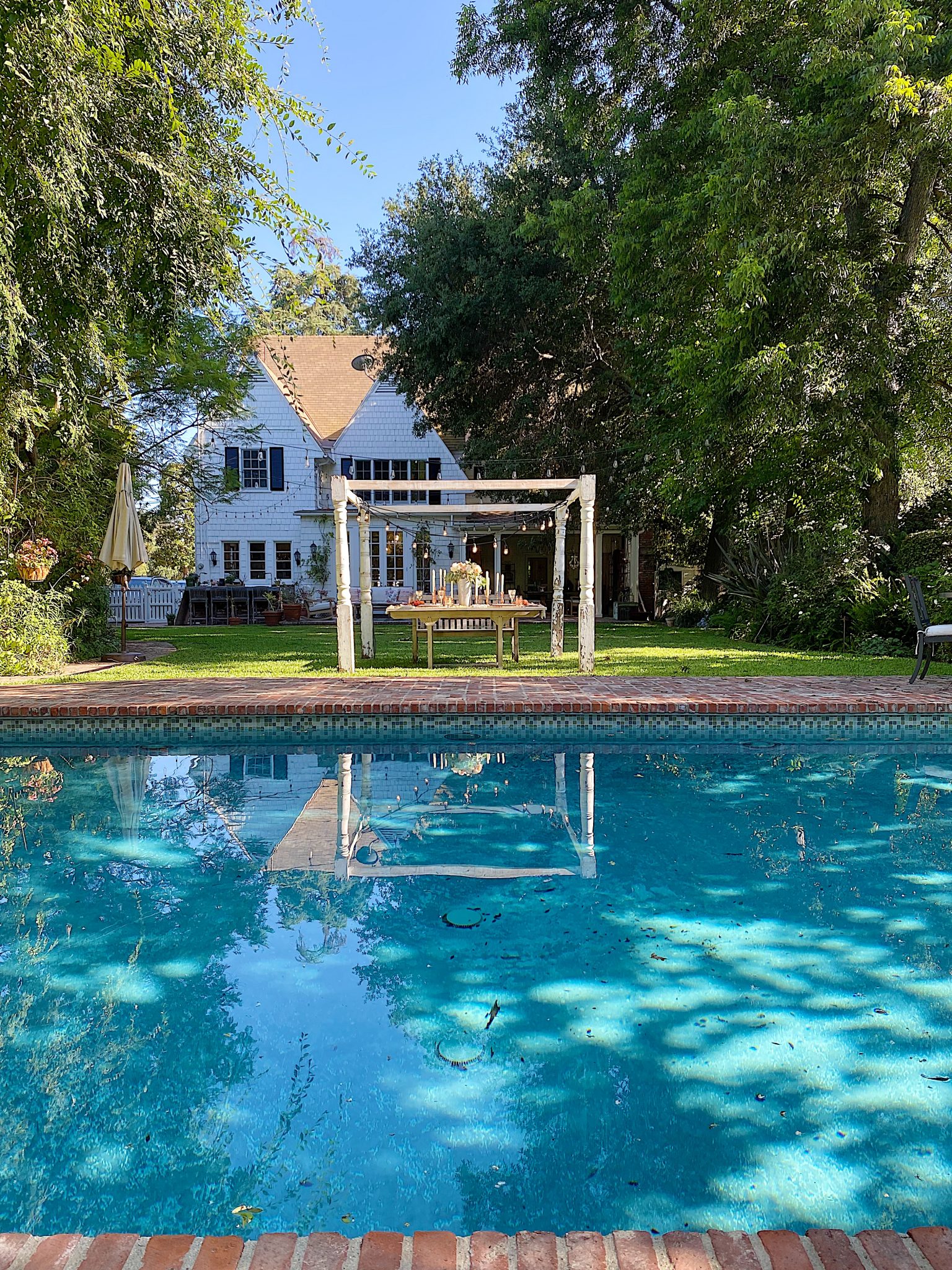 Summer Fun Outdoor Party Across the Pool View