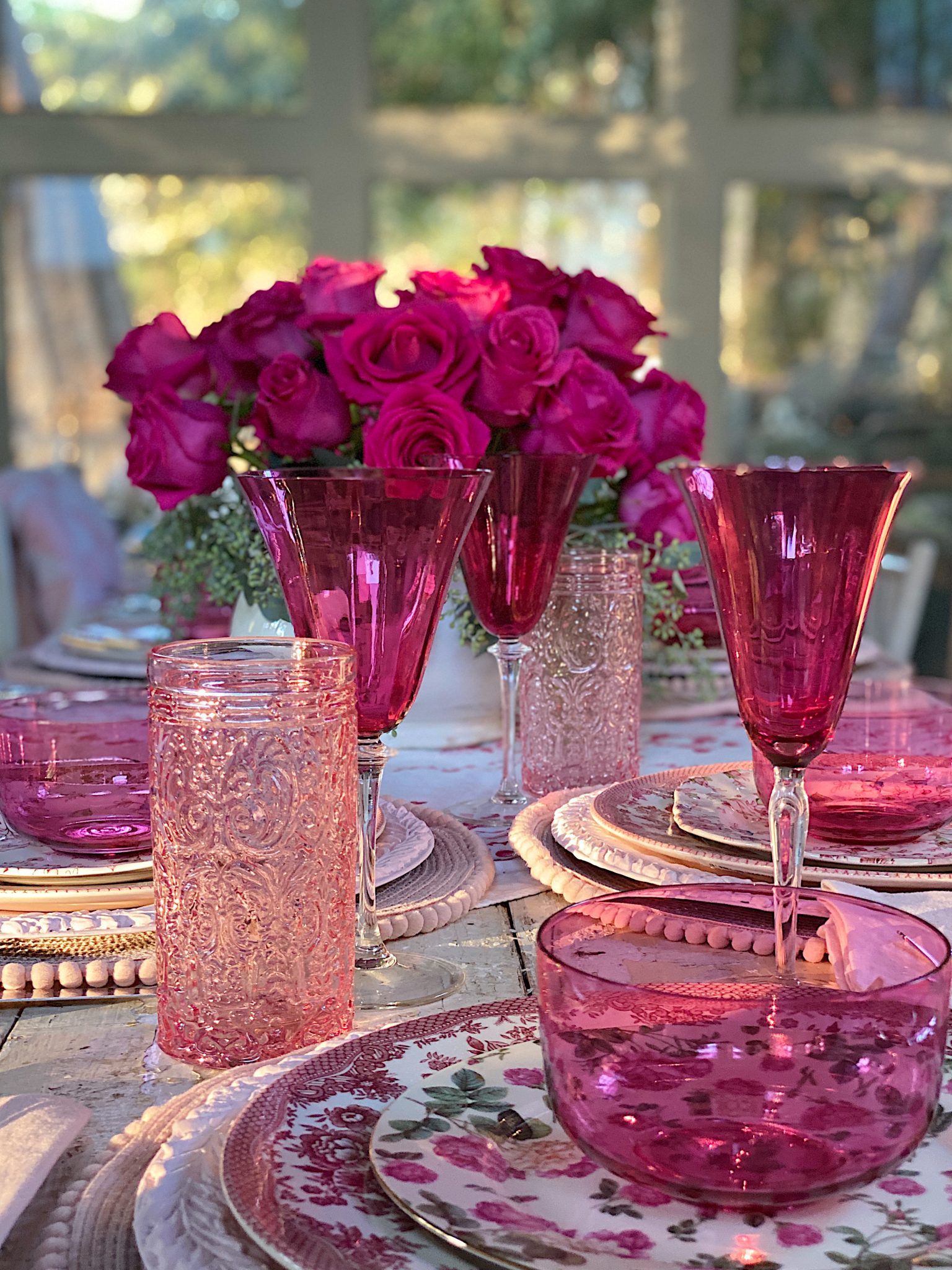 A Christmas Table with Pink Christmas Dinner Plates