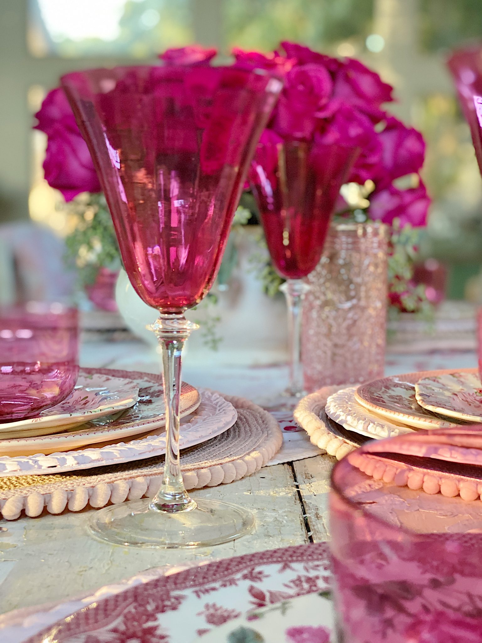 A Christmas Table with Pink Christmas Dinner Plates