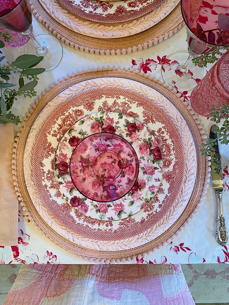 A Christmas Table with Pink Charger Plates
