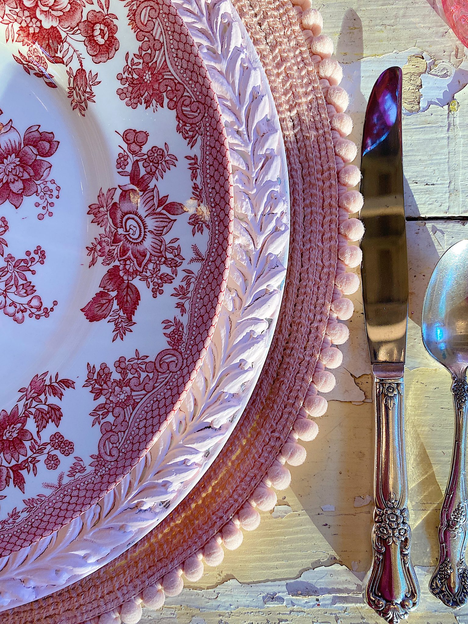 A Christmas Table with Pink Christmas Dinner Plates