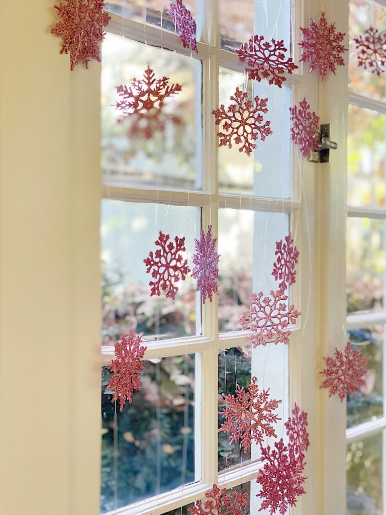 Pink Snowflakes Hanging in the Window