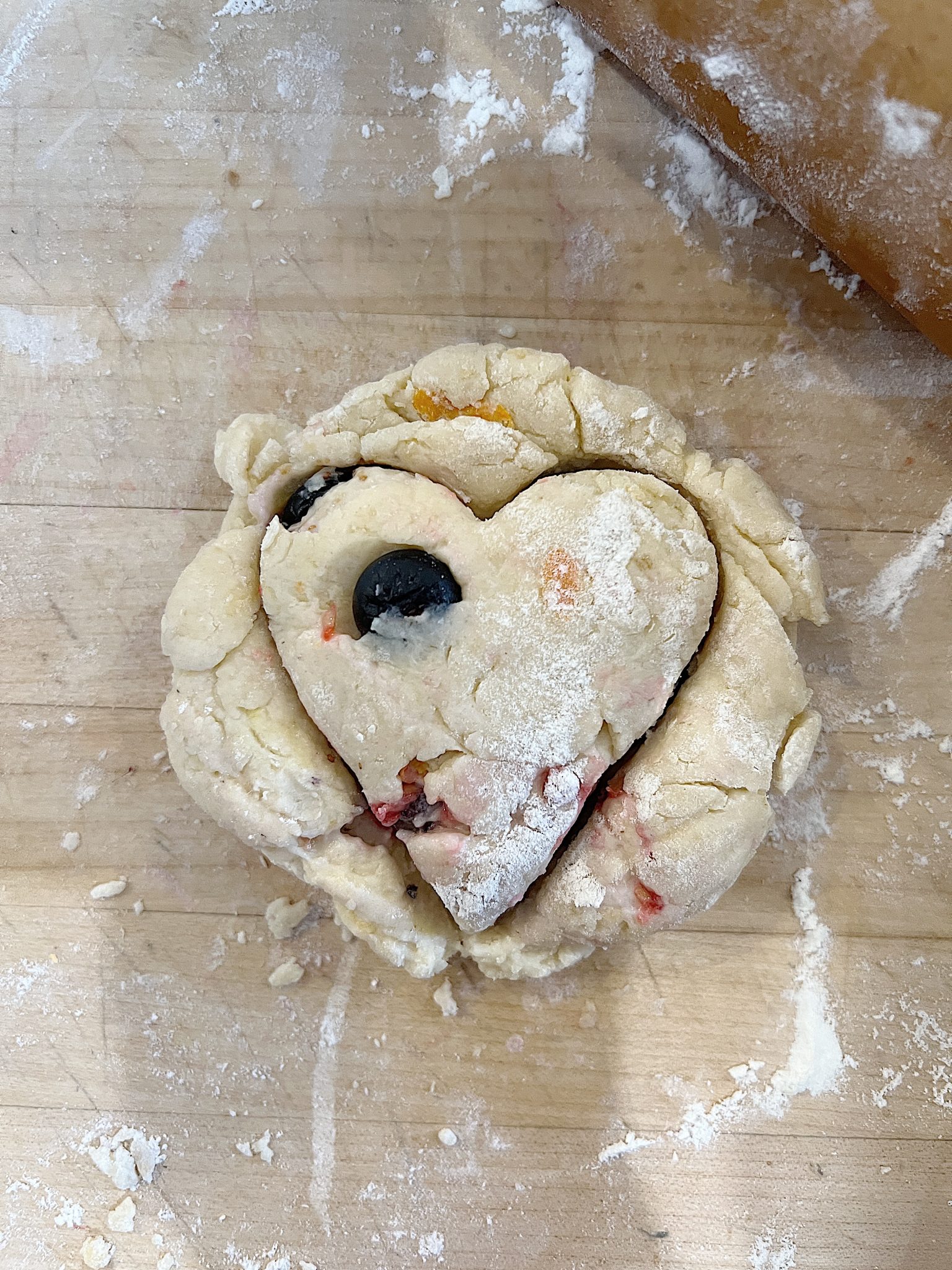 Cutting a Blueberry Raspberry Gluten Free Scones