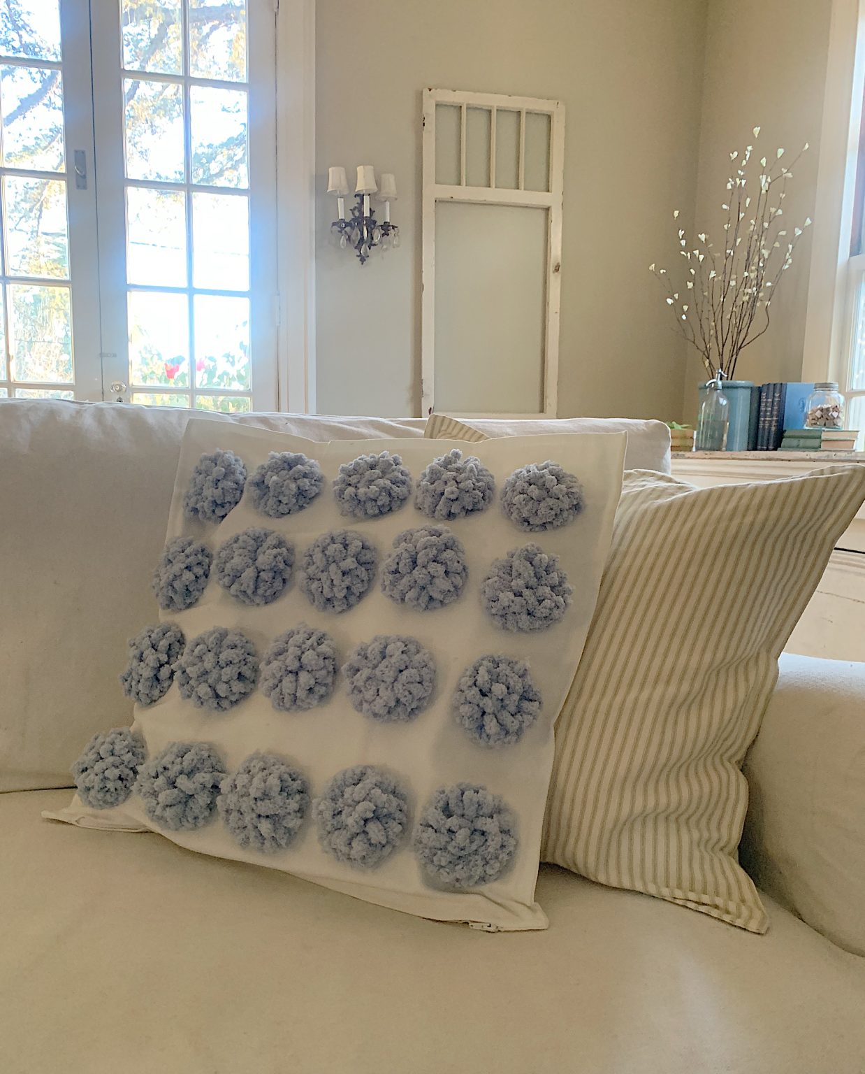 Make a Pom Pom Pillow