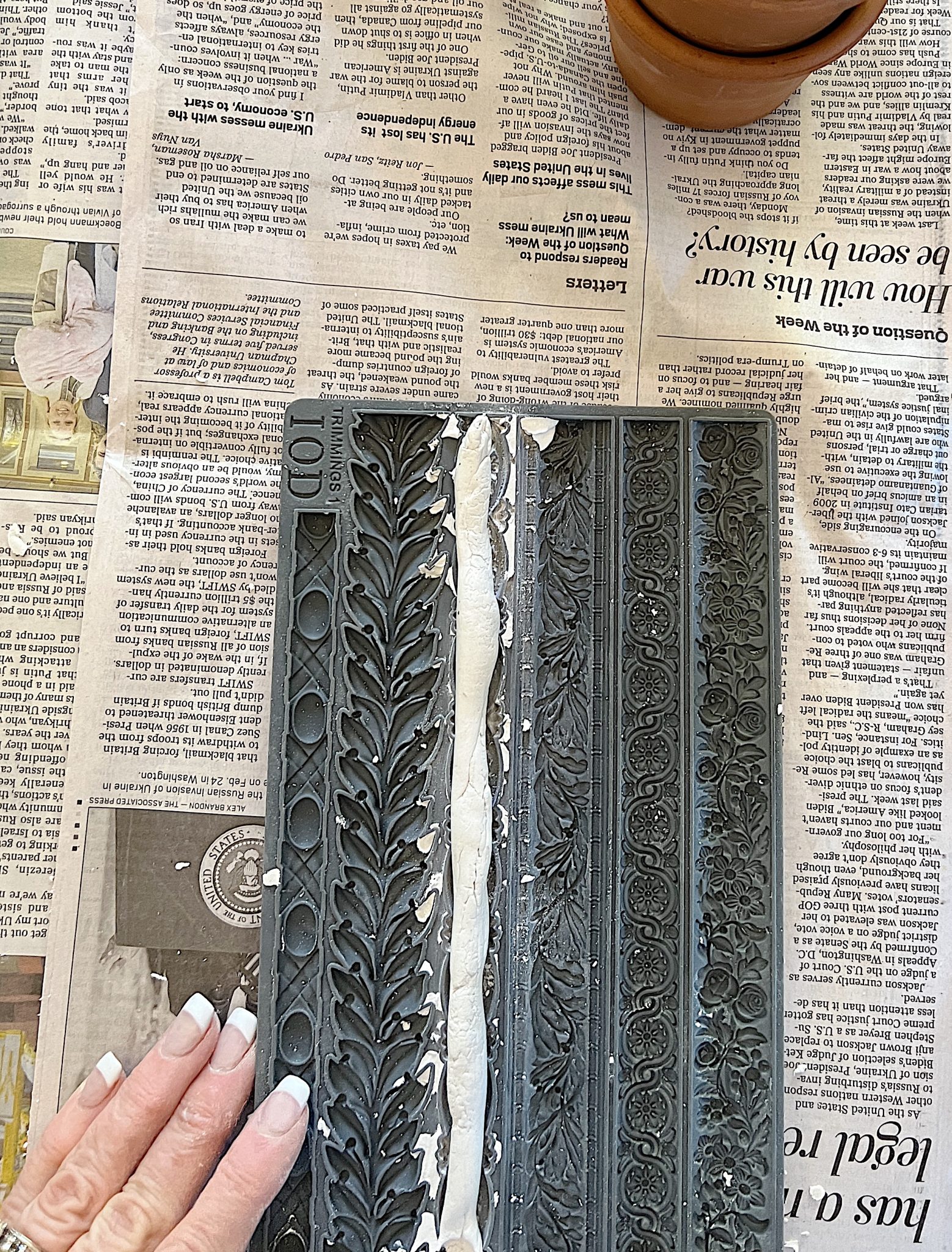 Laying down the Clay on the Mold