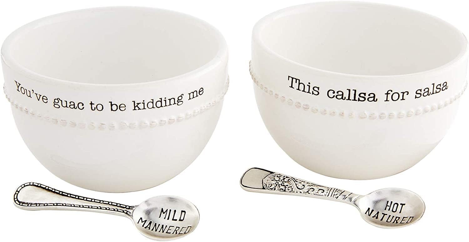Two white bowls with embossed text&mdash;"You've guac to be kidding me" and "This callsa for salsa"&mdash;plus matching spoons labeled "Mild Mannered" and "Hot Natured." Perfect for a happy Taco Tuesday spread!.