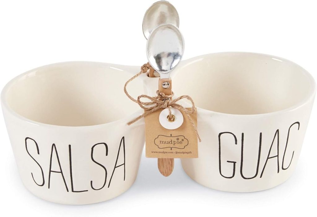 Two white ceramic bowls labeled "SALSA" and "GUAC" are joined together, each with a metal spoon tied to the middle by twine and a brown Mud Pie brand tag—perfect for a happy Taco Tuesday.