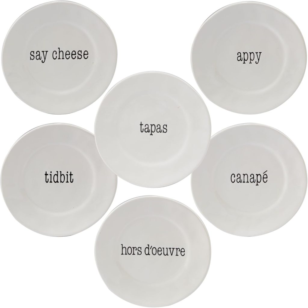 Six white ceramic plates arranged in a circle, each labeled with a different appetizer-related word in black text, add a playful touch to the Art of Entertaining.
