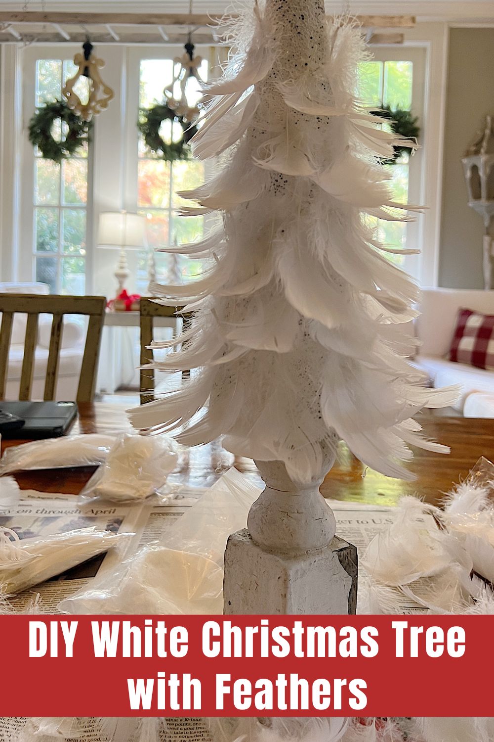 I love my new DIY which is a small Christmas Tree that goes anywhere. This DIY White Christmas tree with feathers is so easy to make!