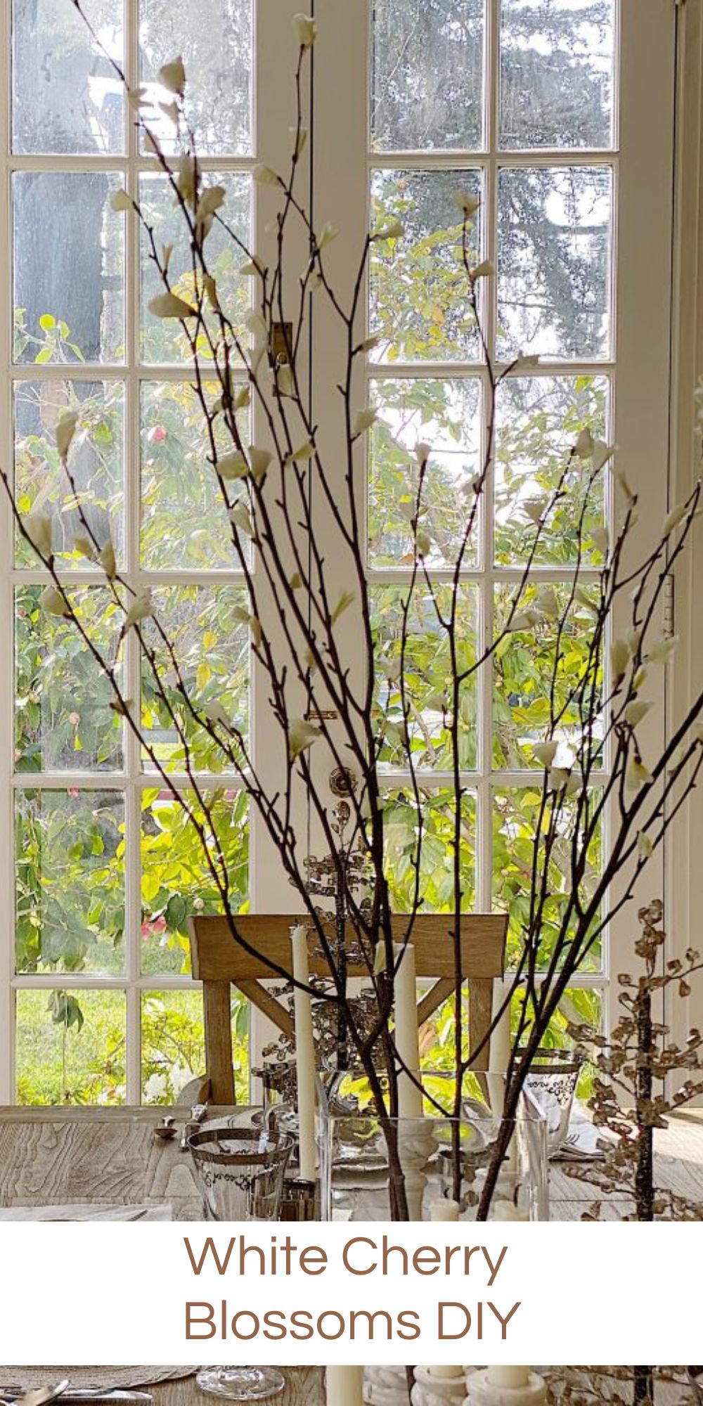 My white cherry blossom stems cost one-third the price of the Pottery Barn ones that inspired me and these will last you forever.