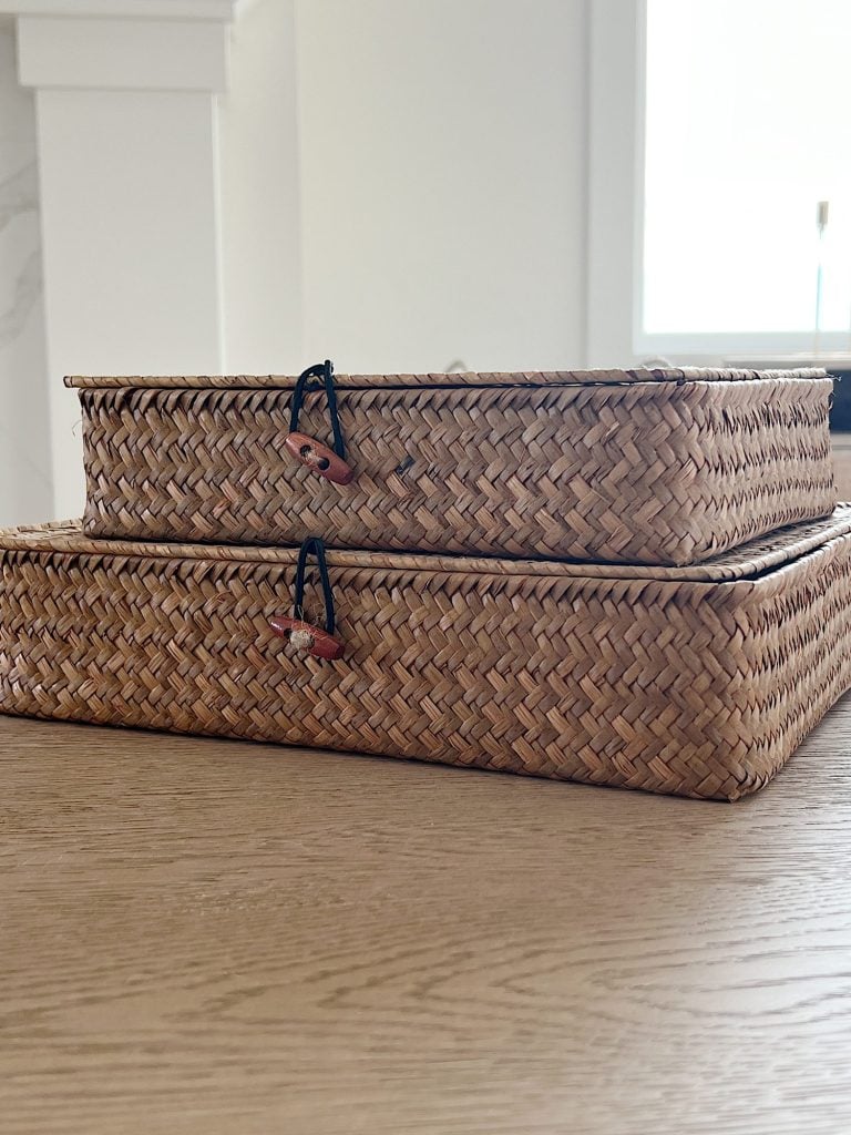 two rattan baskets sittting on top of each other