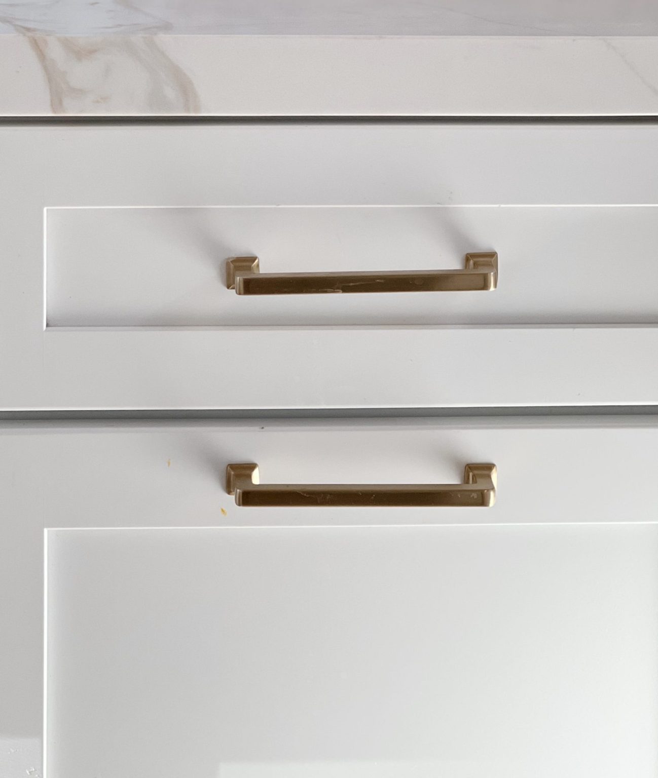 brass pulls on a cabinet