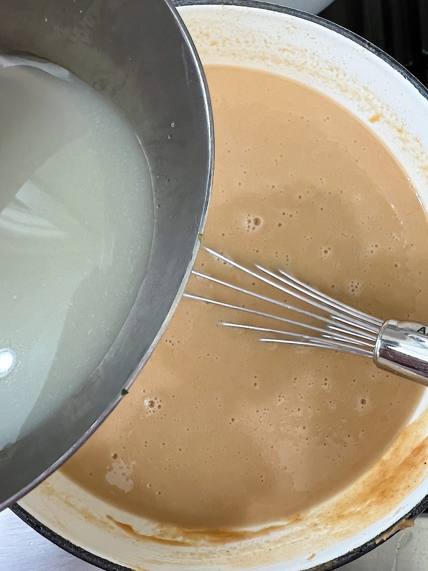 Adding lime juice to a peanut butter soup