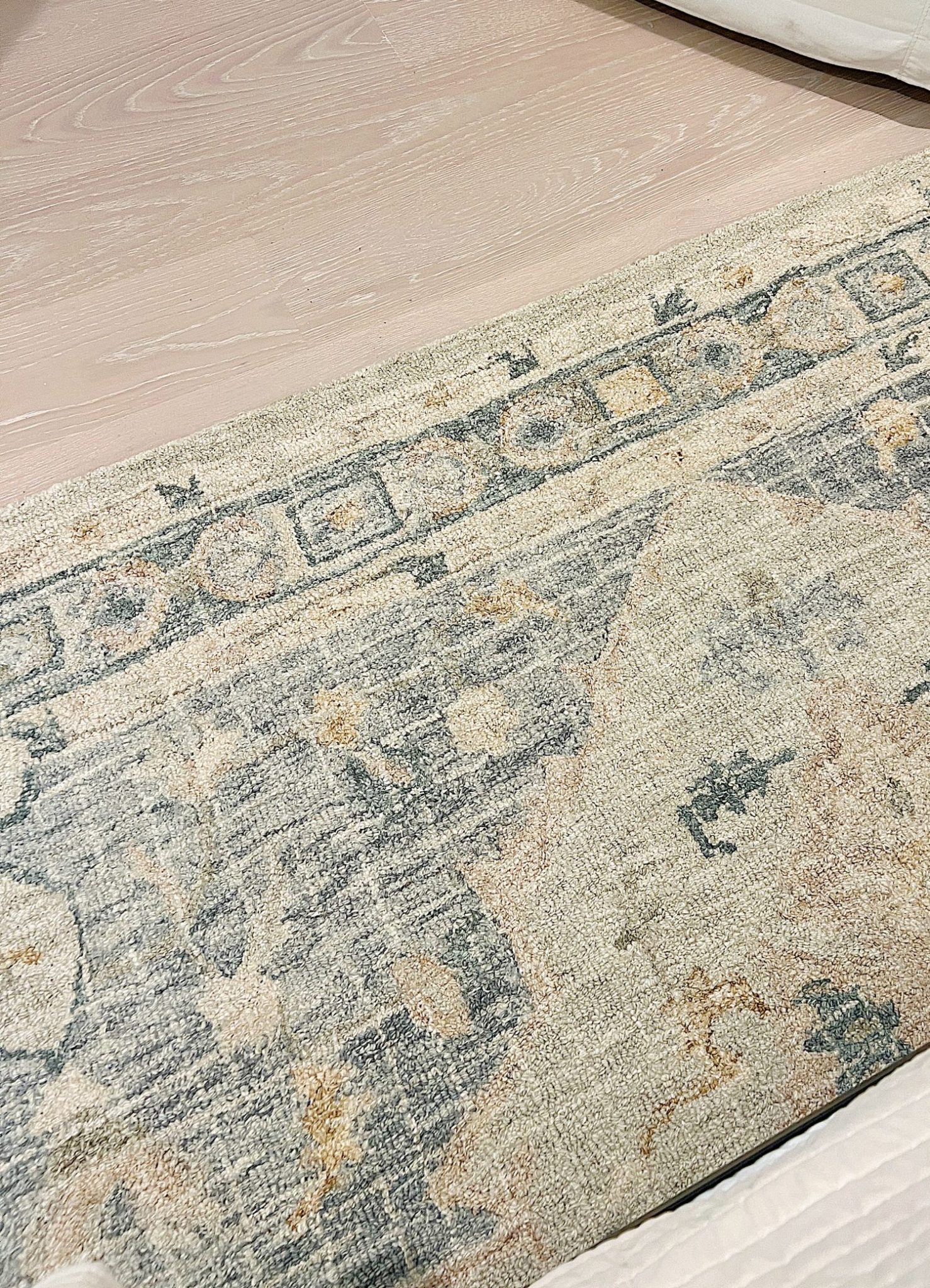 Blue, tan, and offwhite rug from Alexander Home.