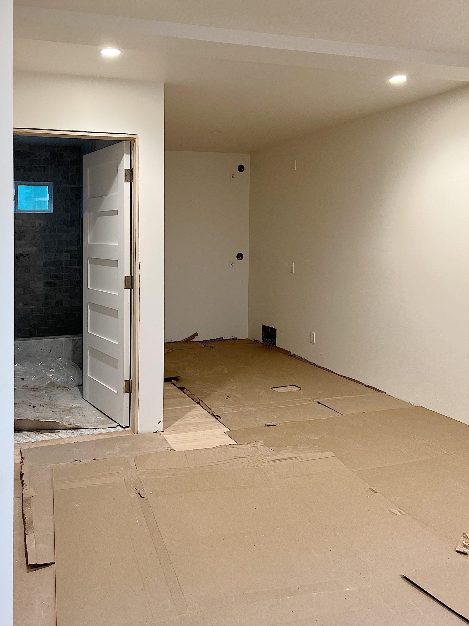 painted drywall in a bedroom with a nook for builtin bunk beds.