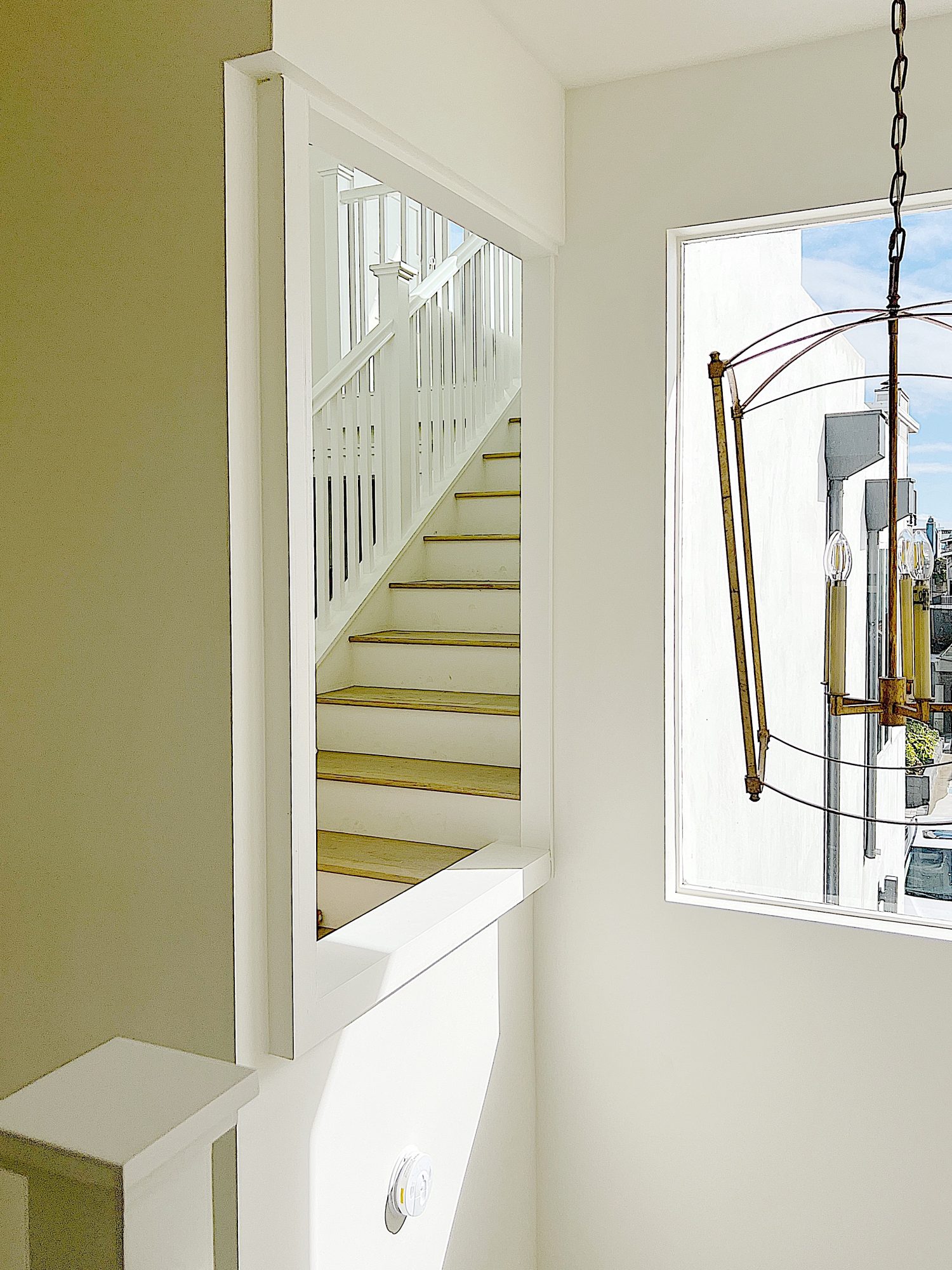 An opening in the wall in a staircase remodel