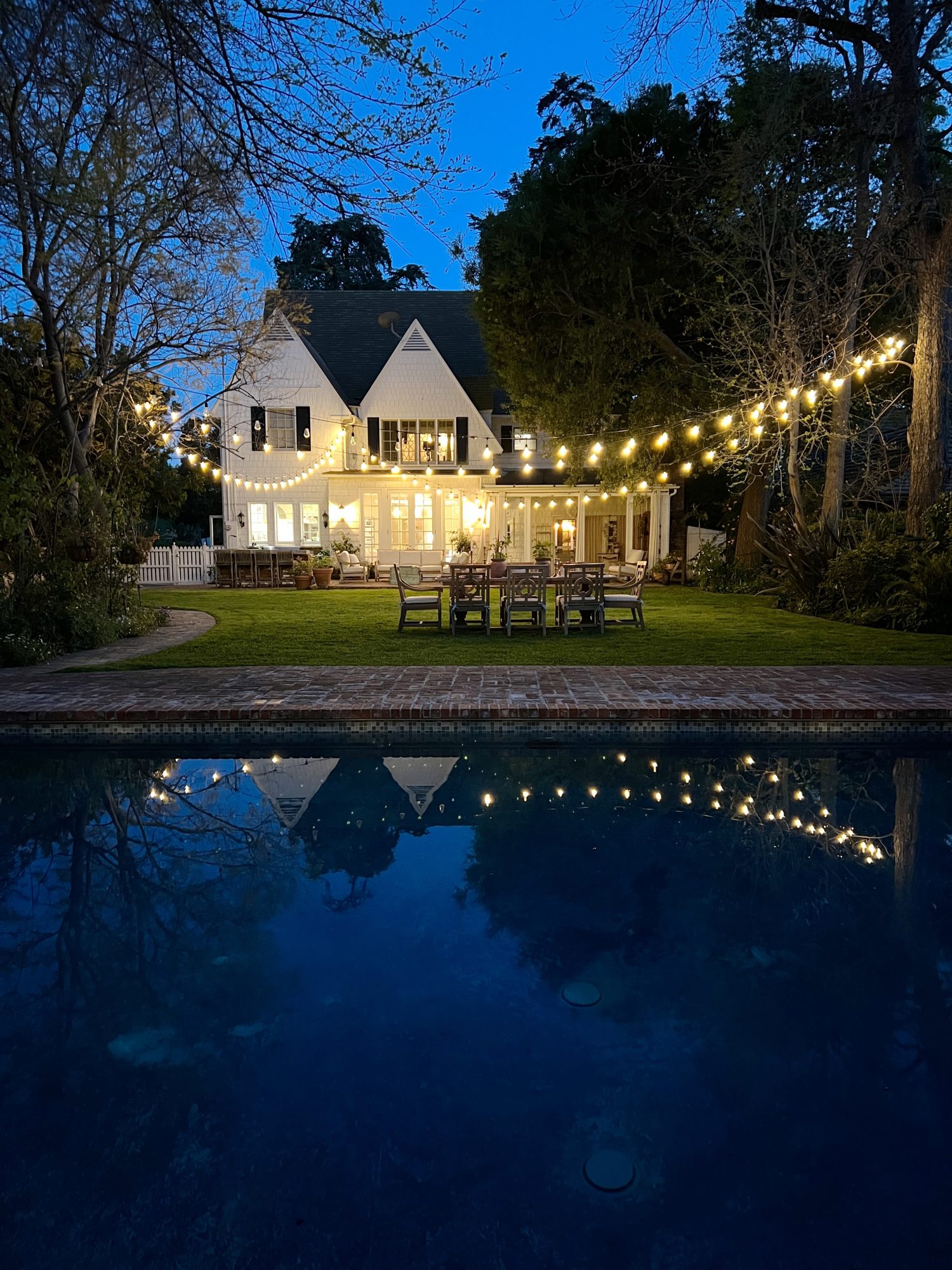 Earth Day dinner at night poolside.