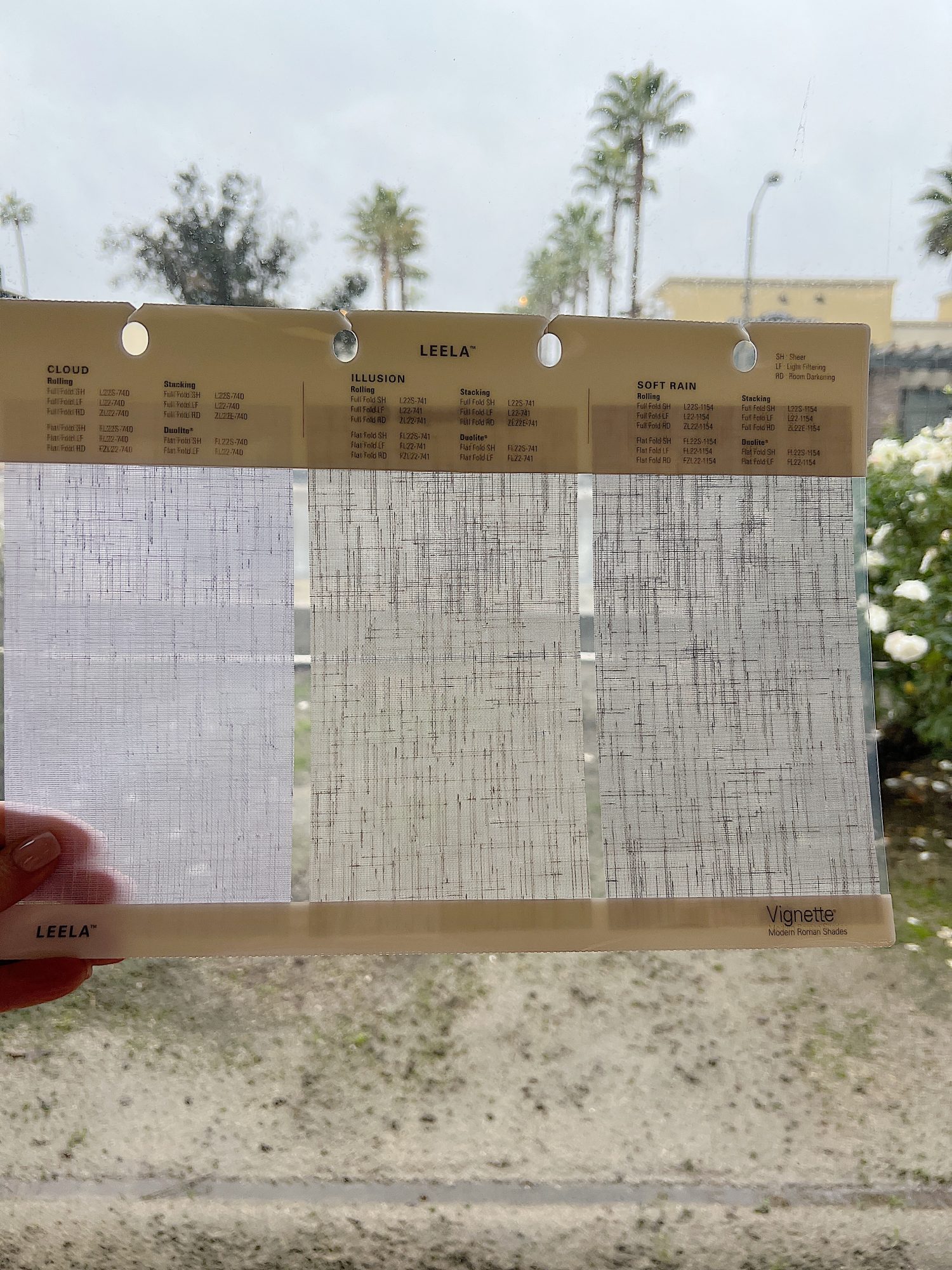 Selecting the blinds for our primary bedroom in our beach house with five windows and an ocean view.