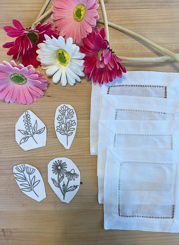 Cotton/linen napkins to be embroidered with flowers using stick and stitch patterned flowers.