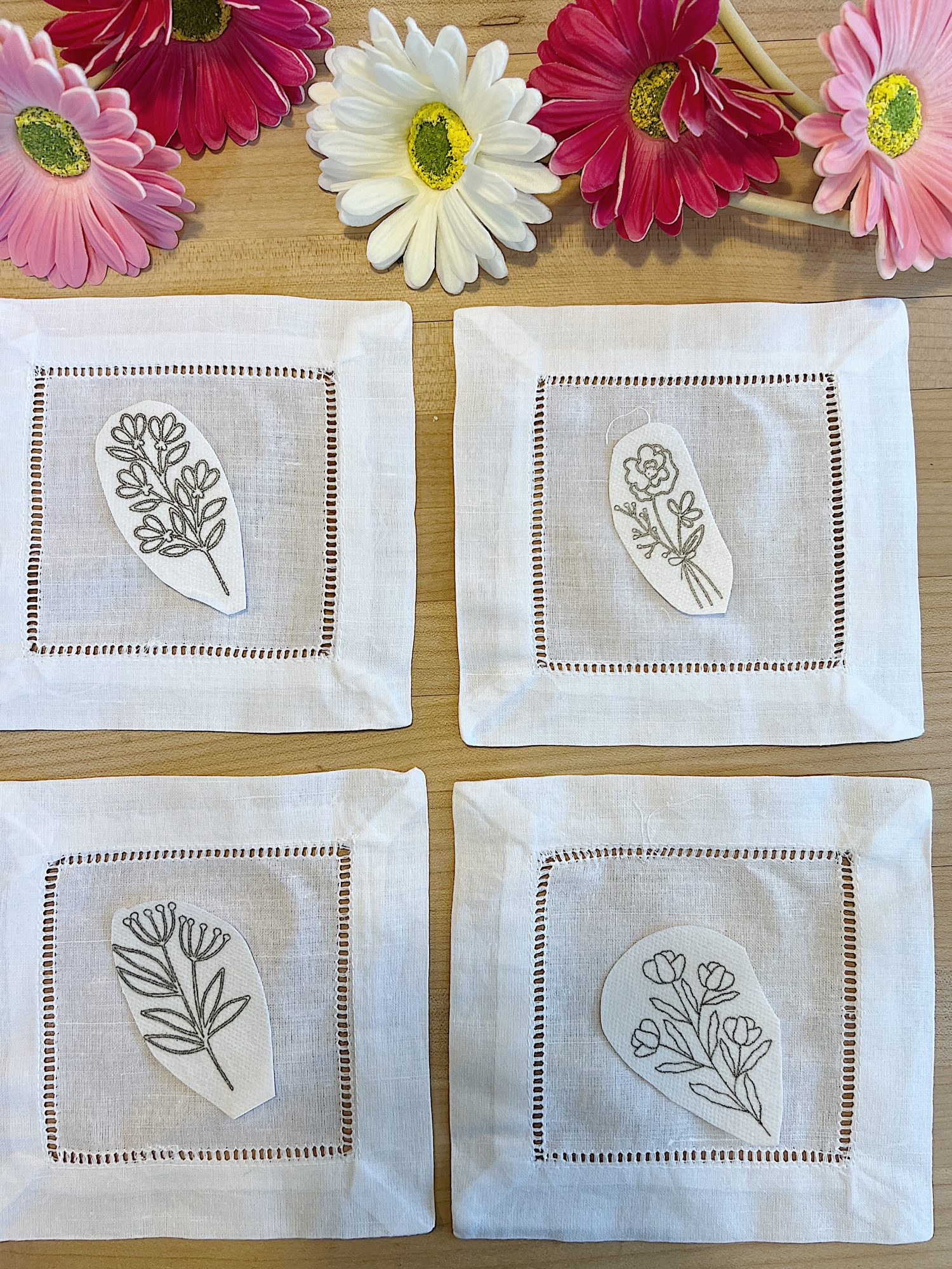 Cotton/linen napkins to be embroidered with flowers using stick and stitch patterned flowers.