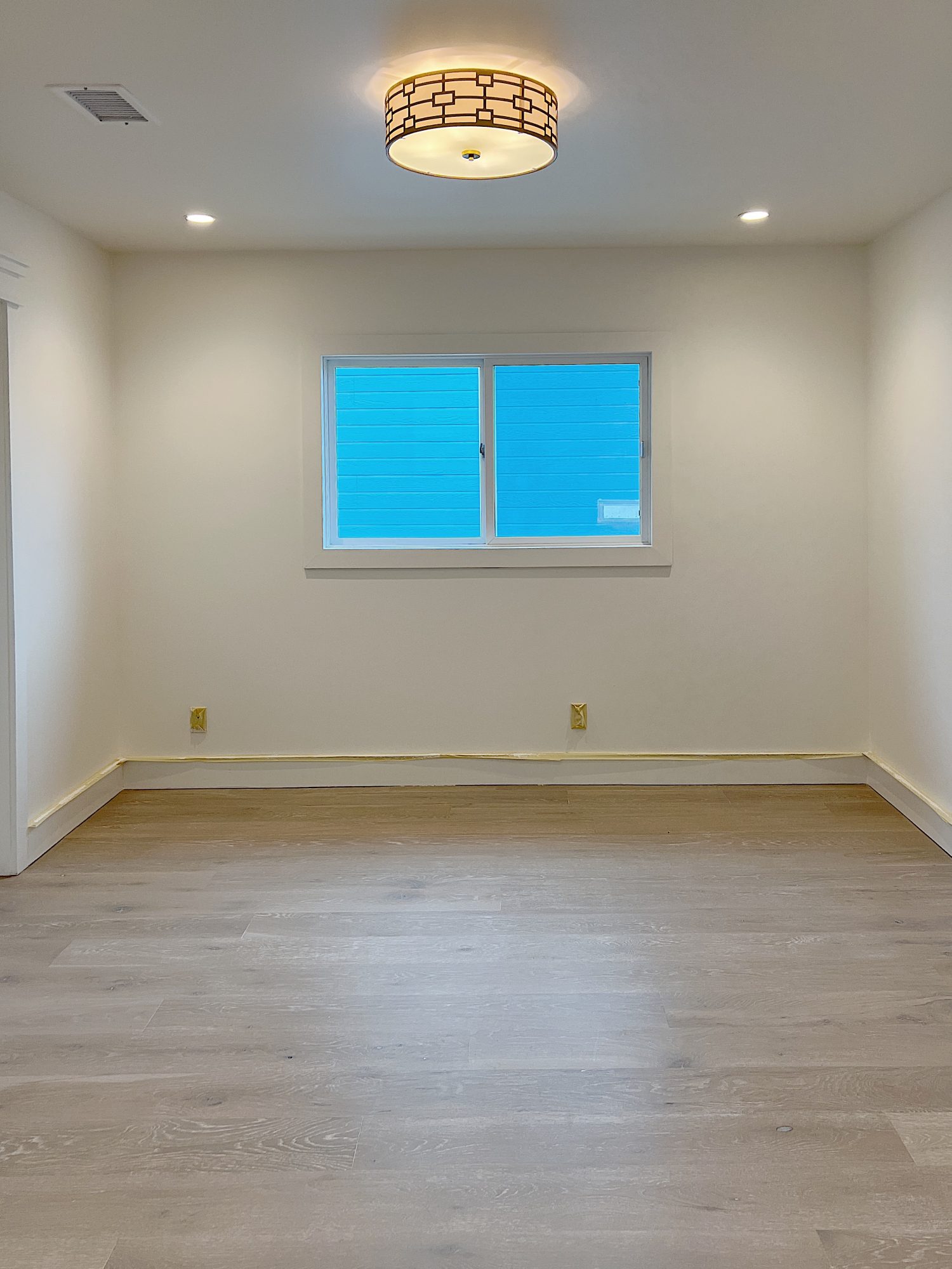 A flooring remodel used the existing hardwood floors and new engineered hardwood.