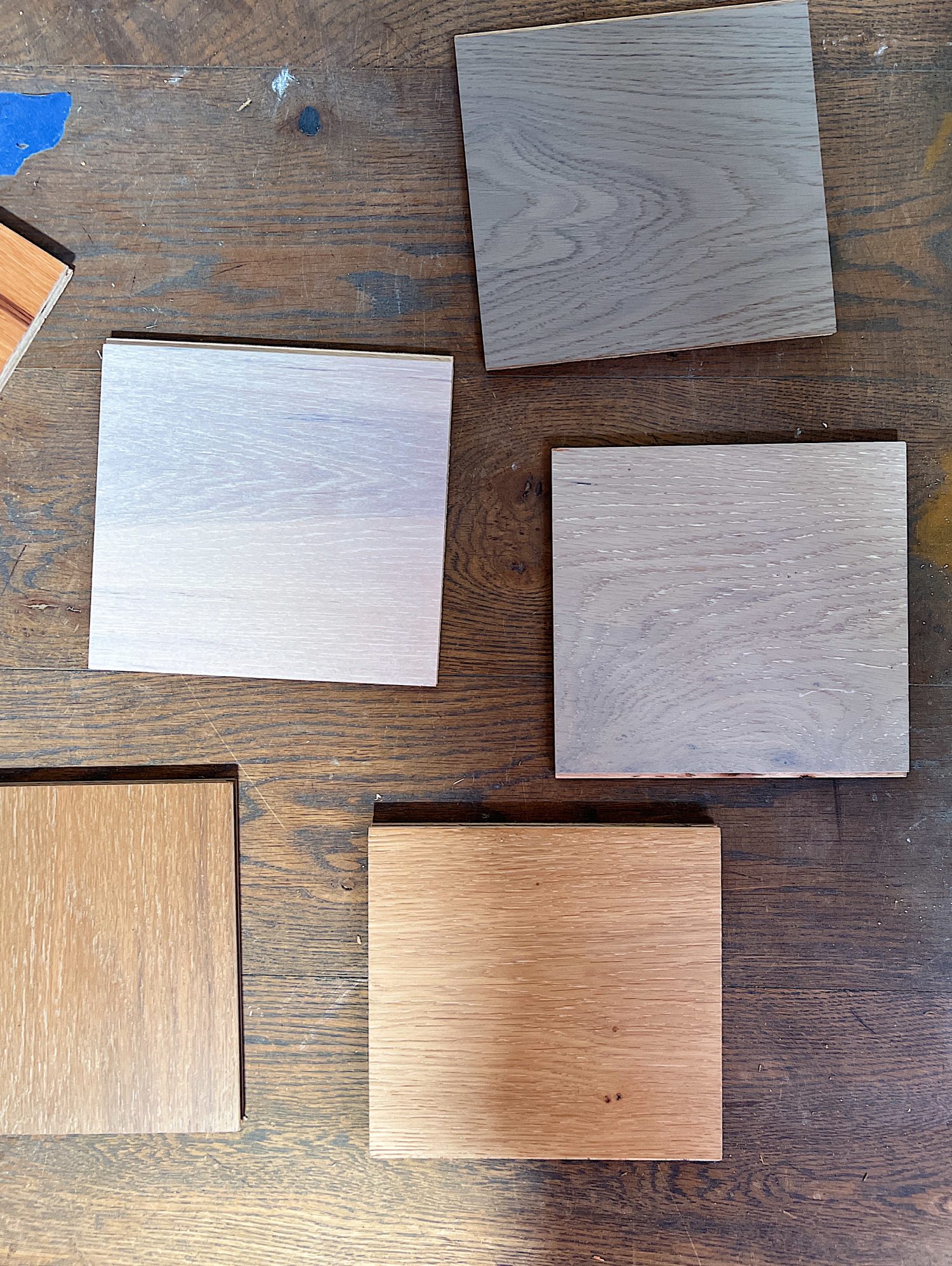 A flooring remodel used the existing hardwood floors and new engineered hardwood.