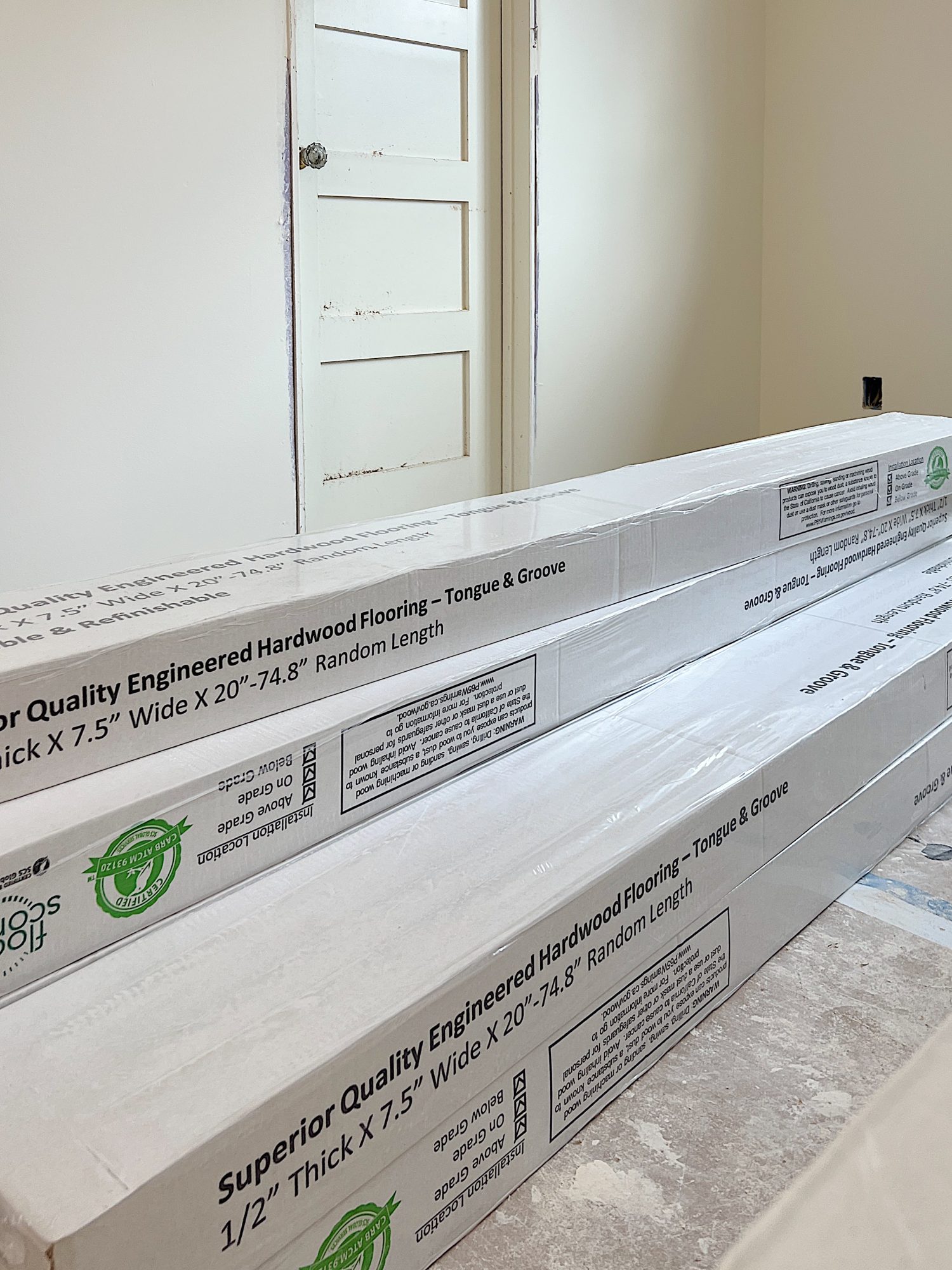 A flooring remodel used the existing hardwood floors and new engineered hardwood.
