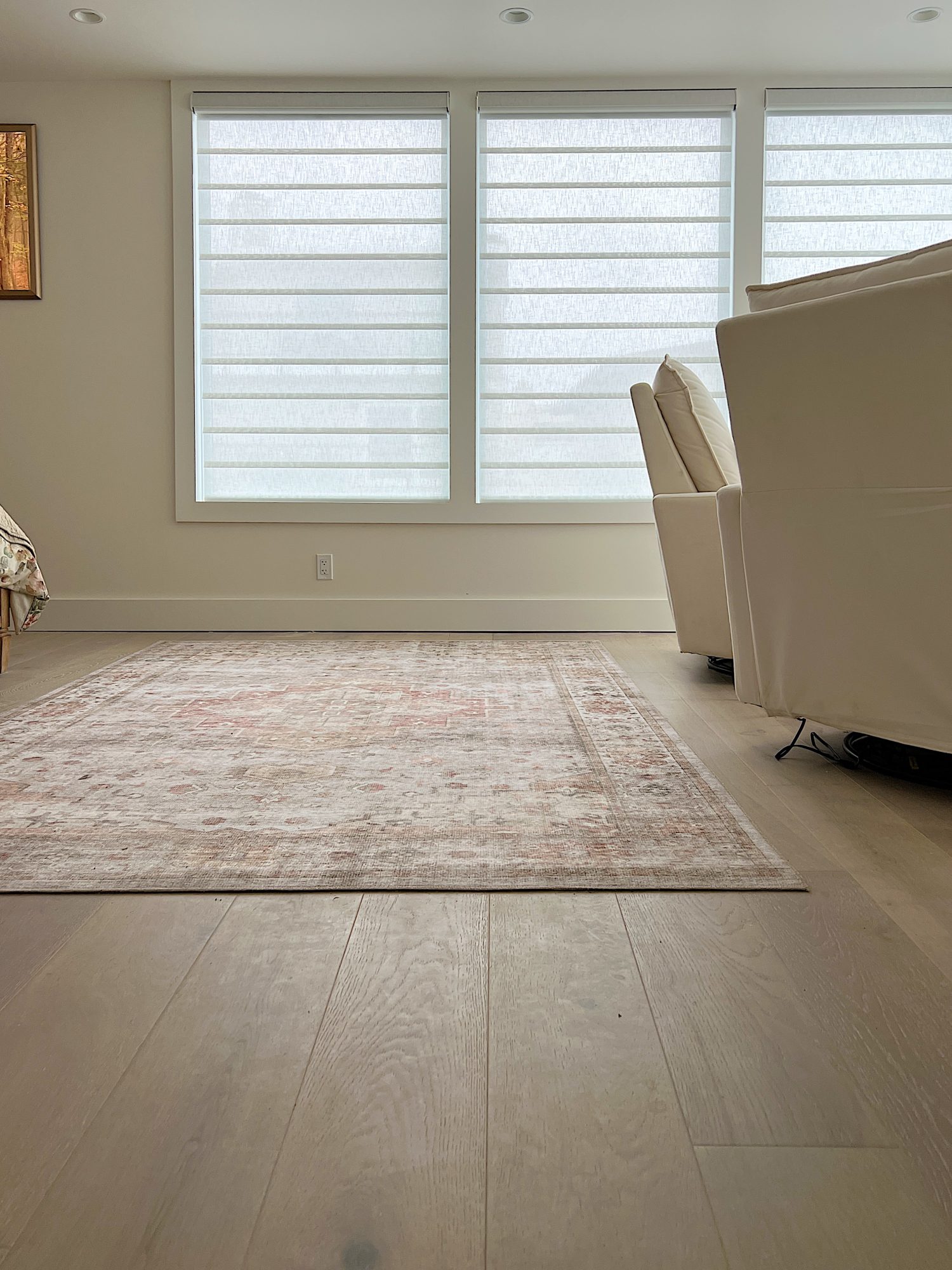 A flooring remodel used the existing hardwood floors and new engineered hardwood.