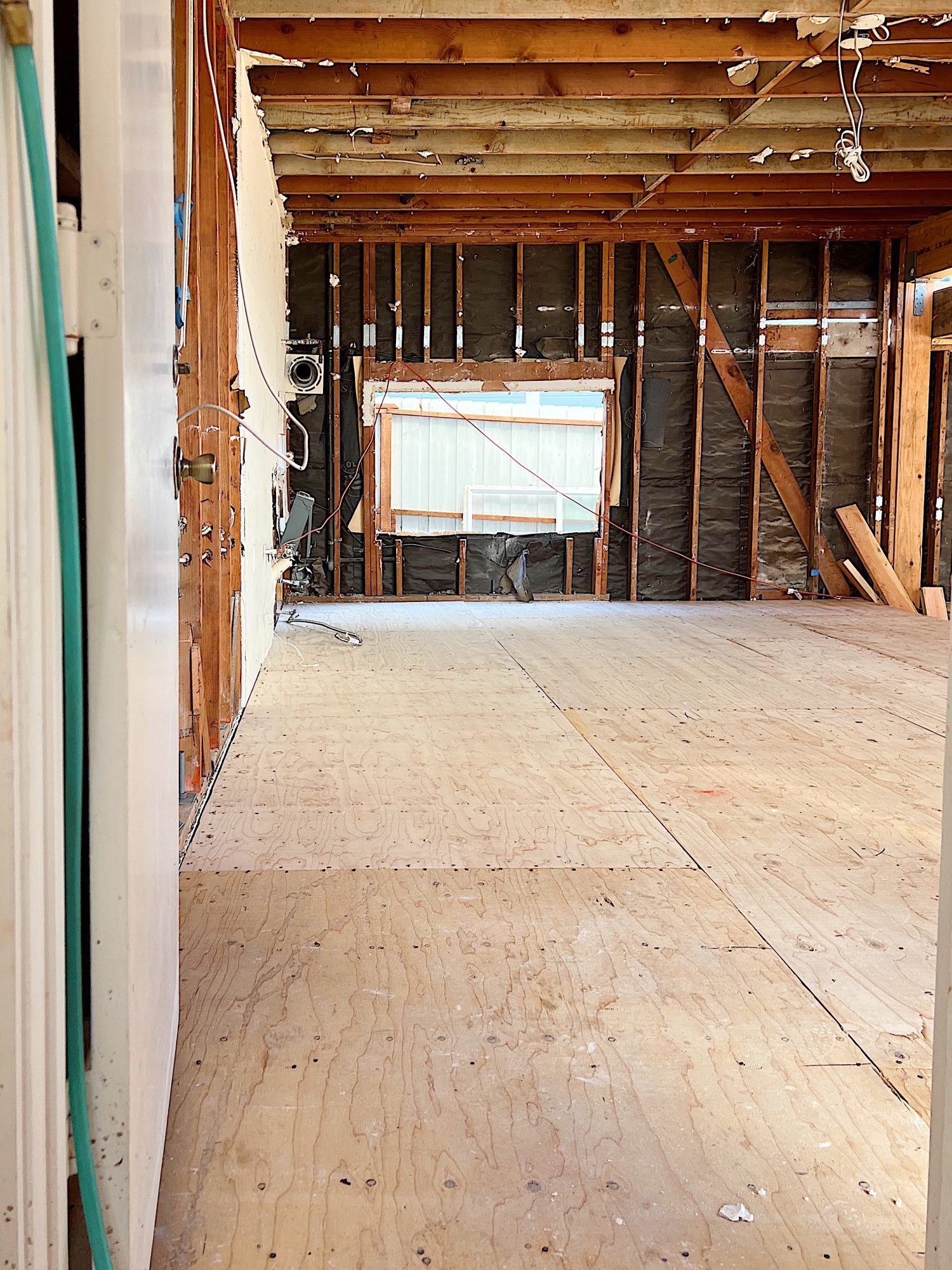 A flooring remodel used the existing hardwood floors and new engineered hardwood.
