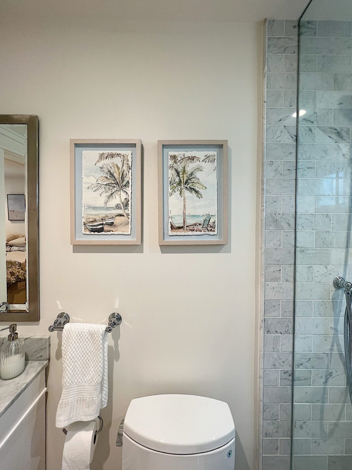 A newly constructed en suite bathroom with a step in steam shower 9with tub), single marble vanity and decor.