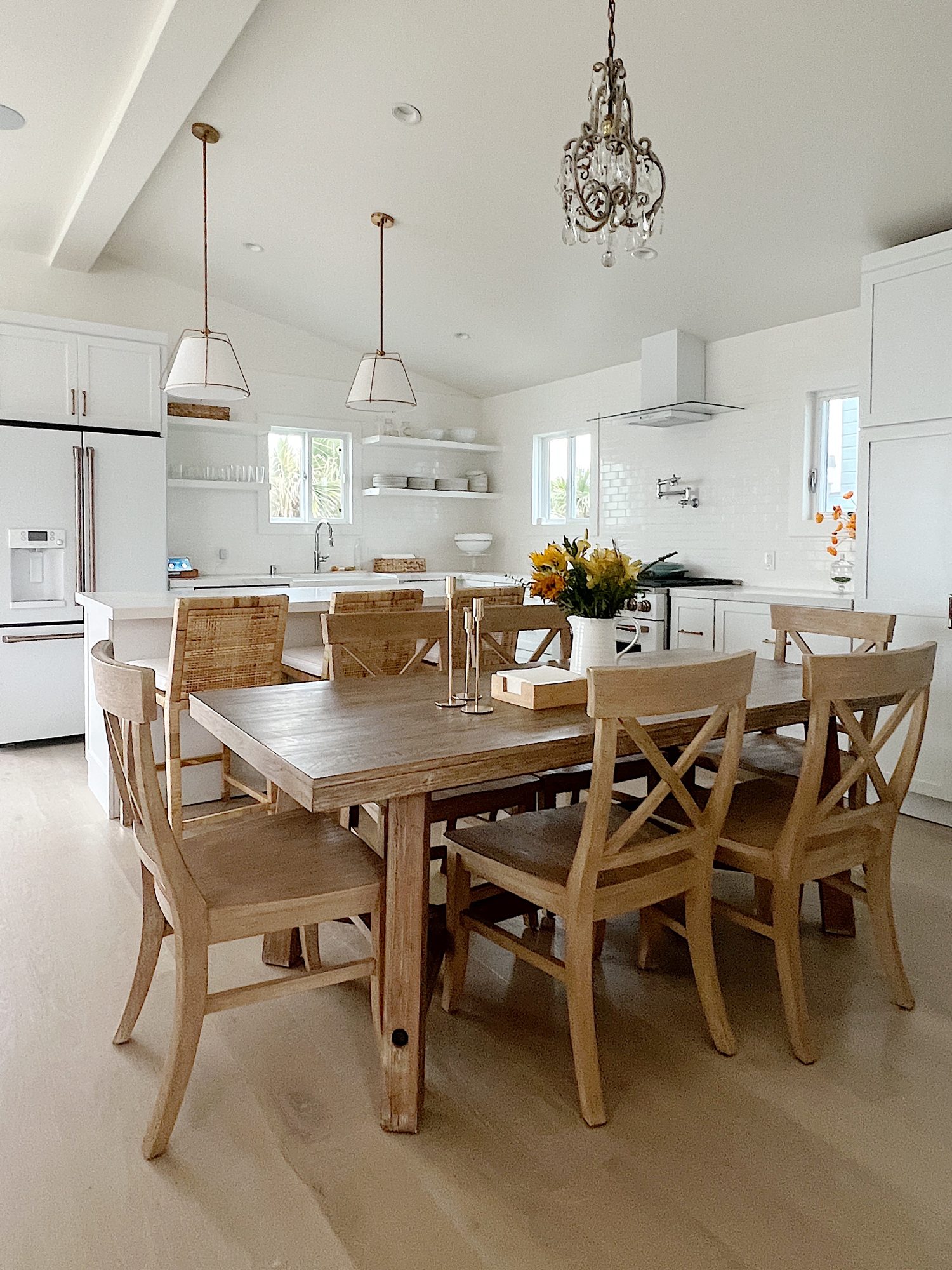 The Beach House family room styled in off-white and tan decor.