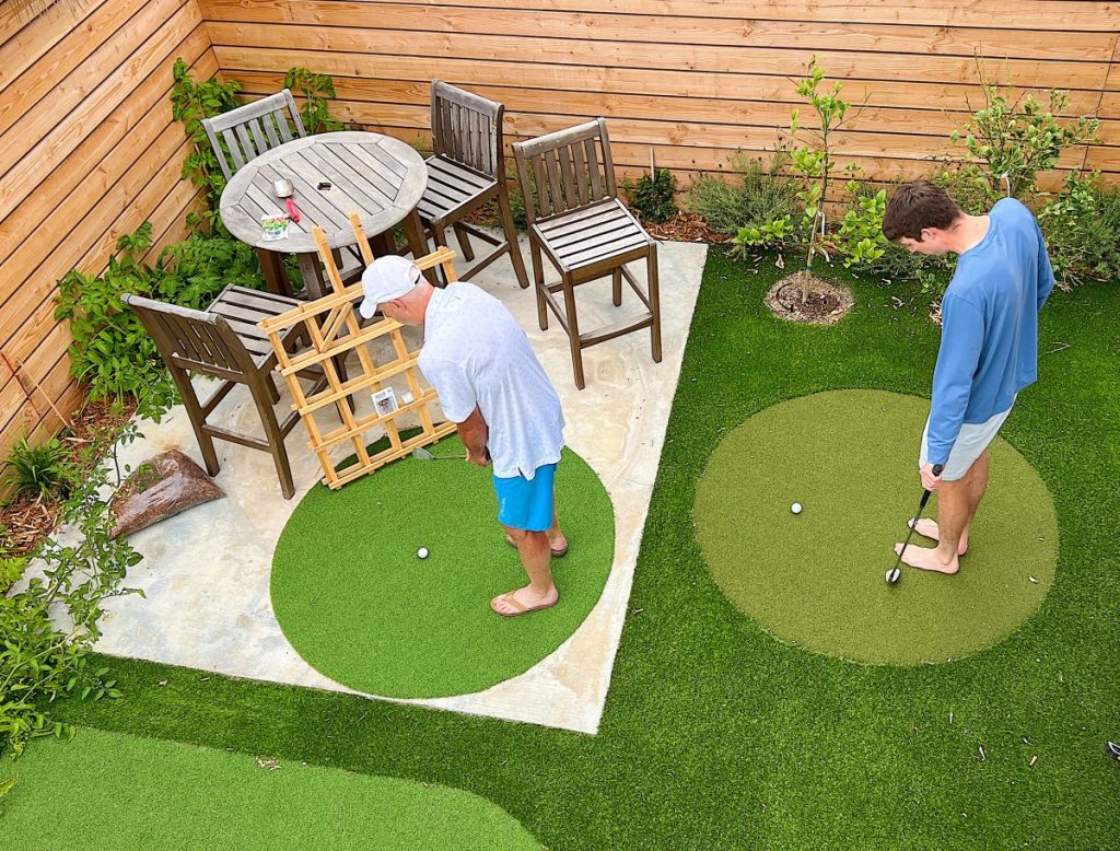 Michael and Dave chipping on our Backyard Putting Green