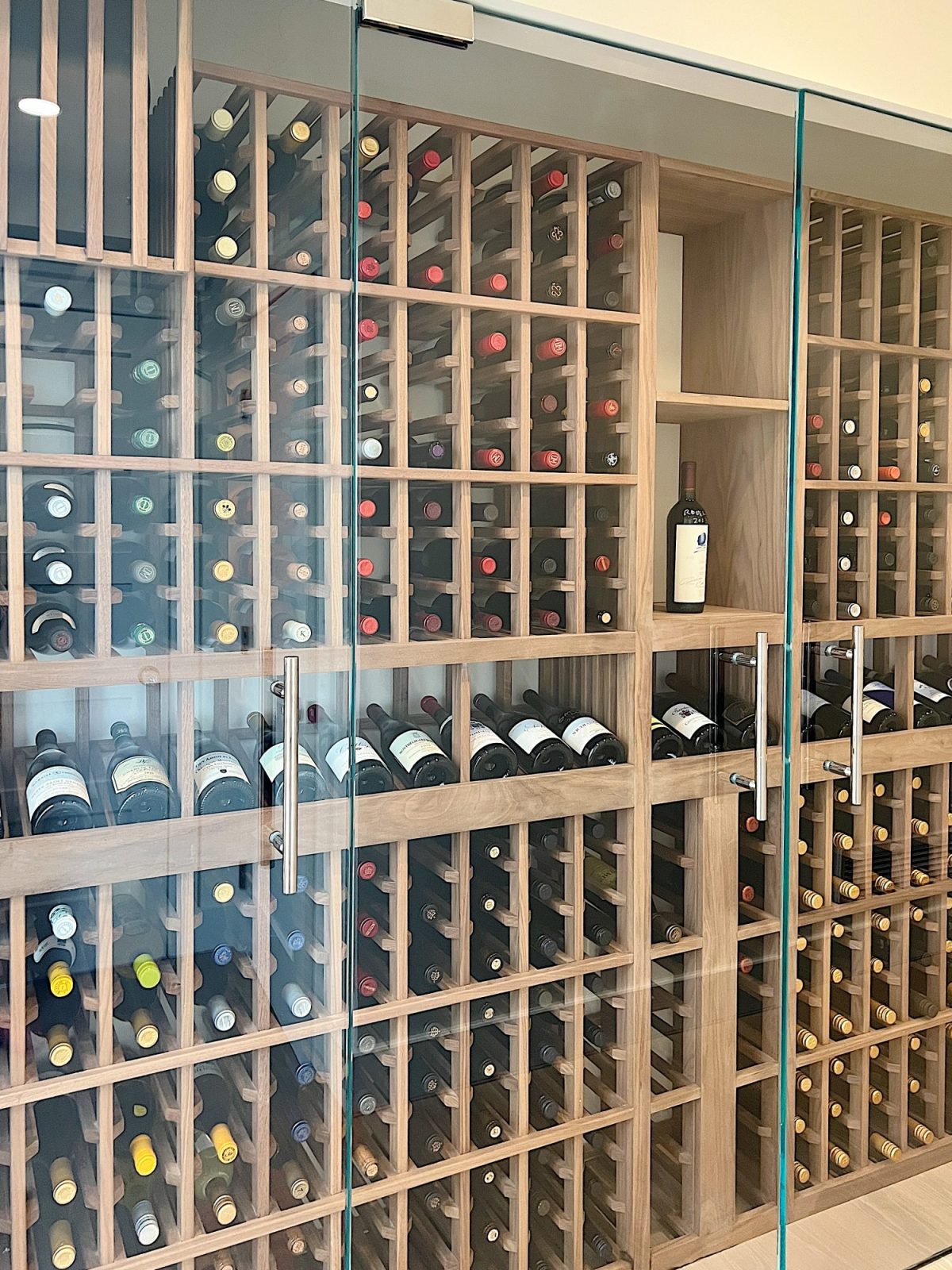 Our home wine cellar built in a hallway at our beach house.