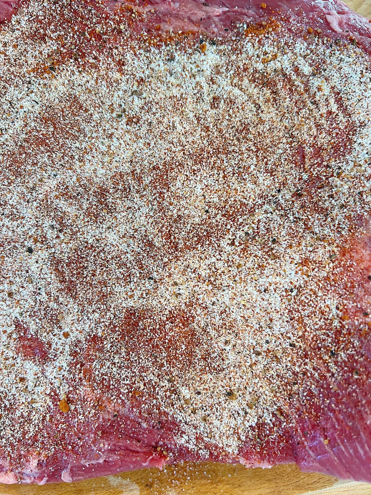Making smoked brisket with a homemade rub.