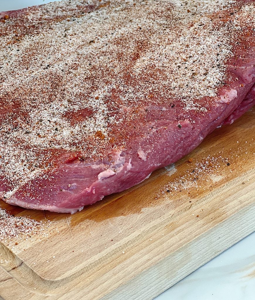 Making smoked brisket with a homemade rub.