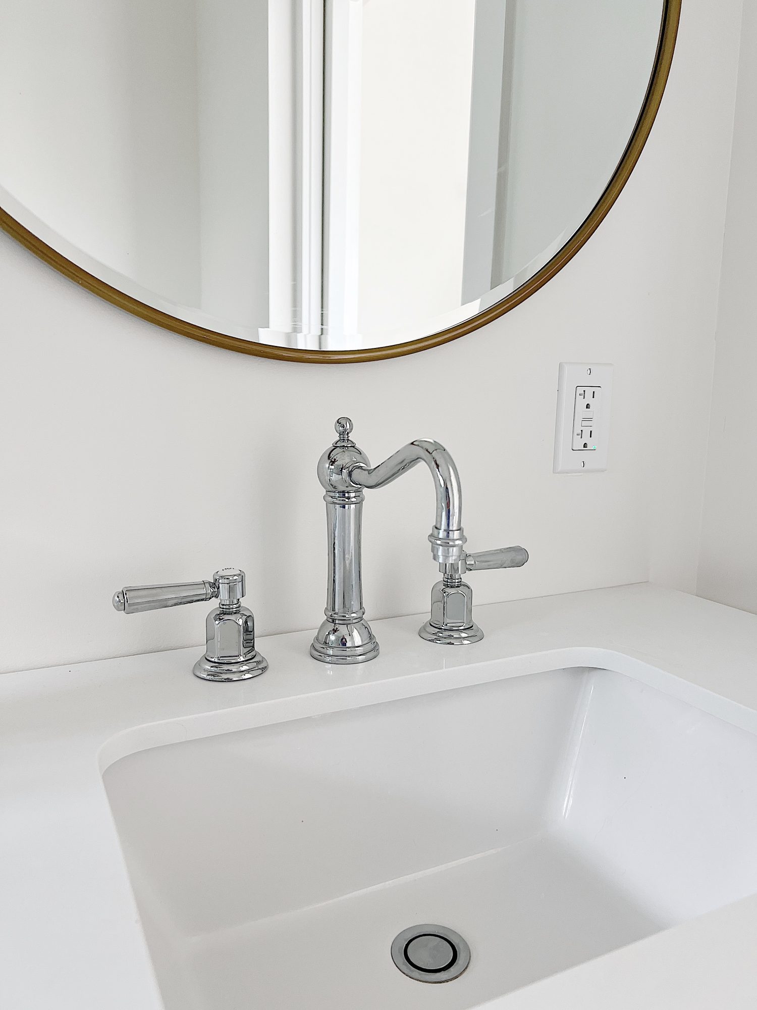 Our primary bathroom with a walk in shower and California faucets and hardware.