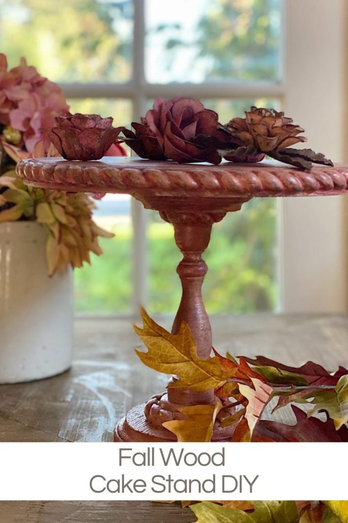 A handmade wood cake cake stand in fall colors.