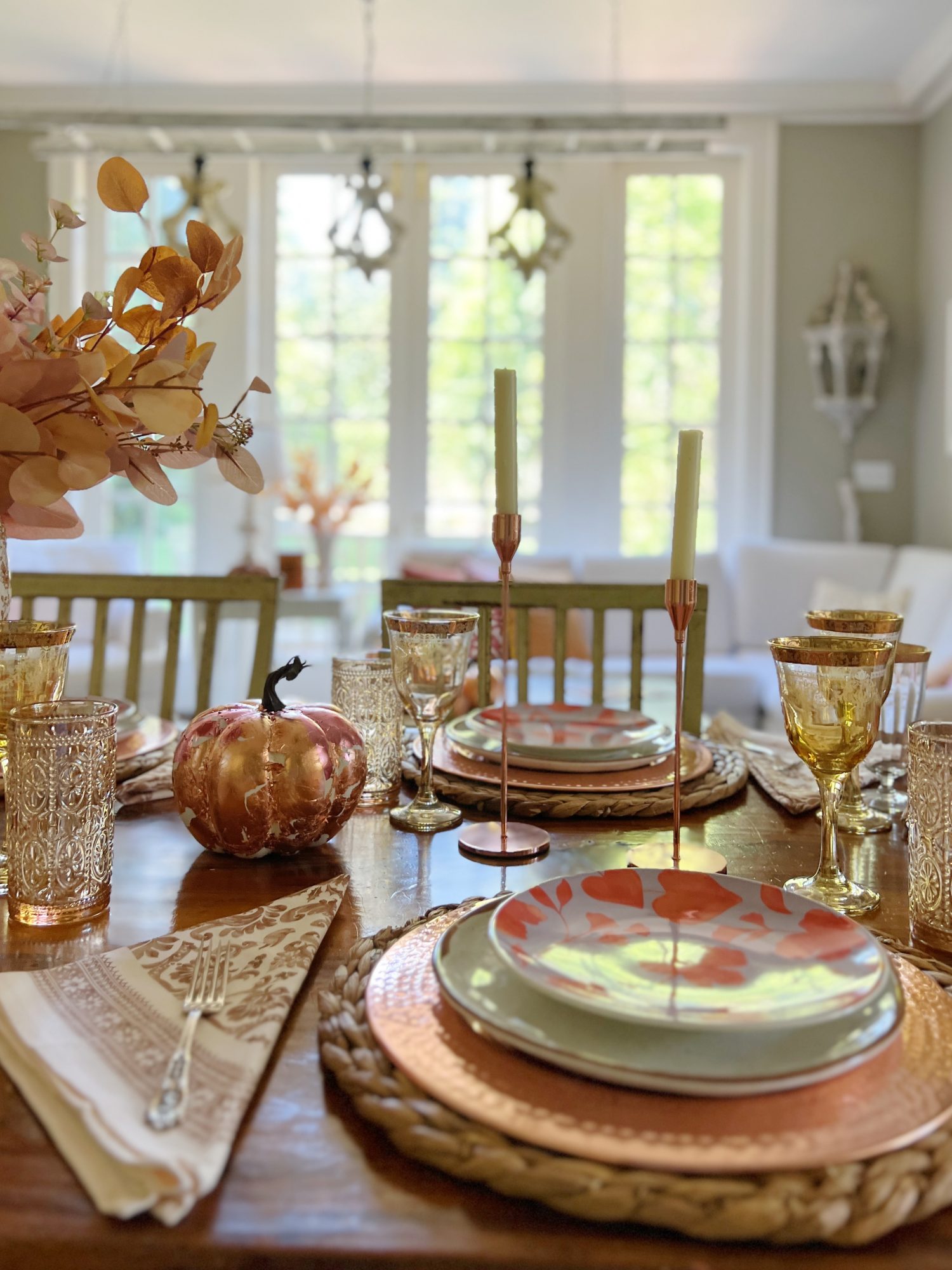 Decorating our family room with peach, pink, and copper repurposed and recycled fall decor.