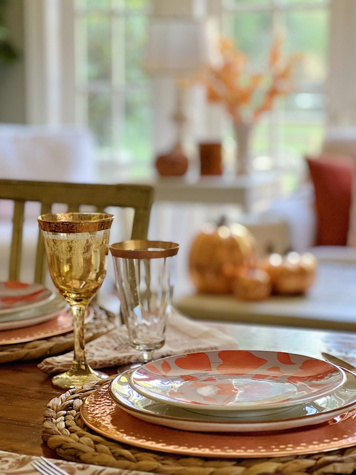 Decorating our family room with peach, pink, and copper repurposed and recycled fall decor.